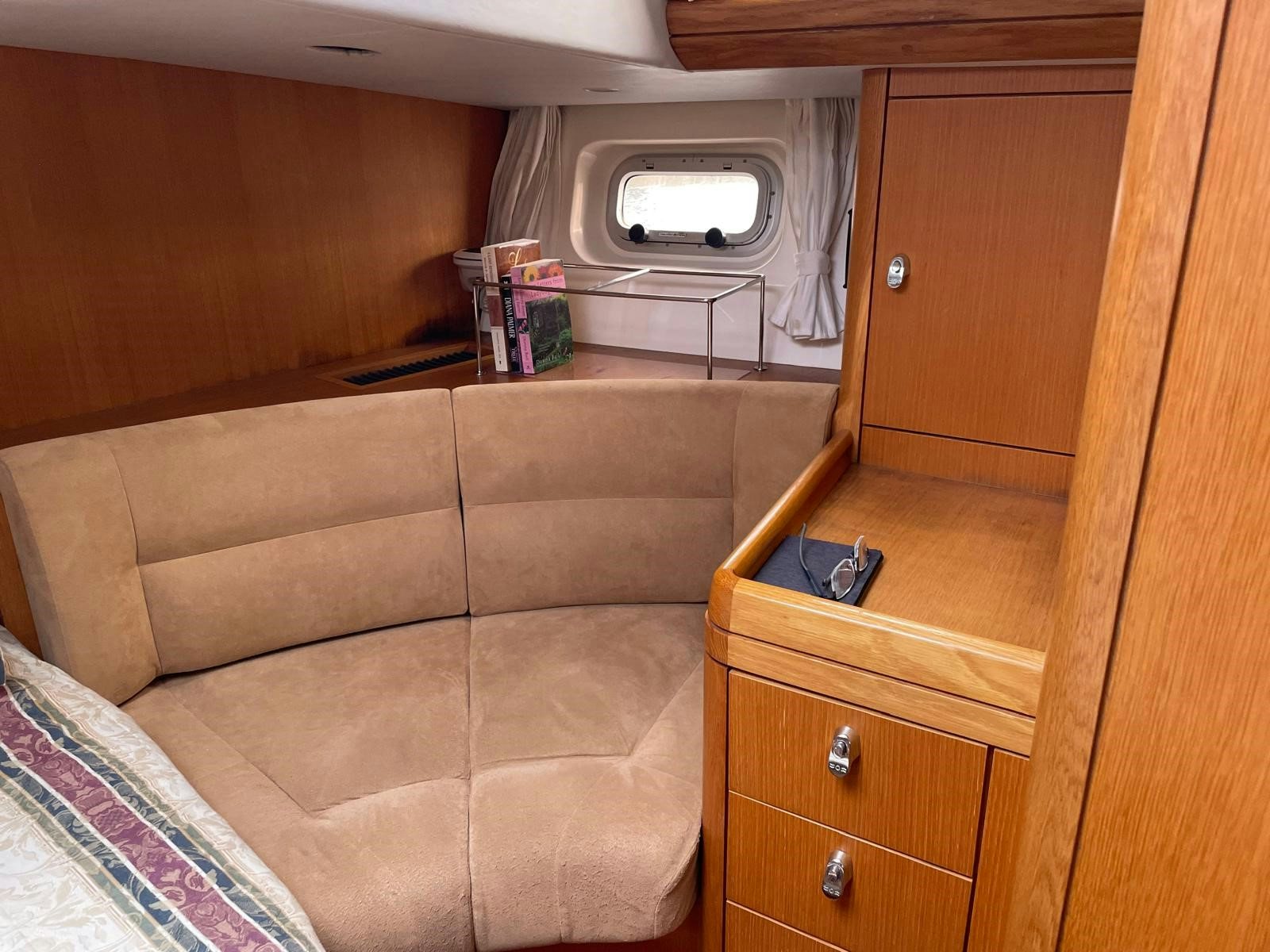a couch in a room aboard DREAM AGAIN II Yacht for Sale
