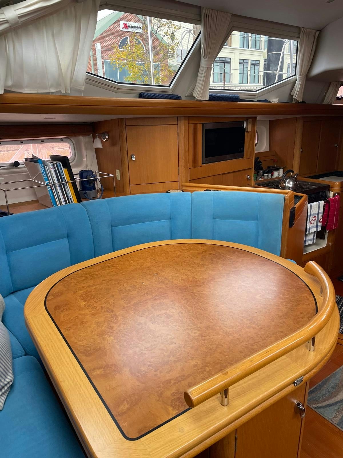 a wooden table in a room aboard DREAM AGAIN II Yacht for Sale