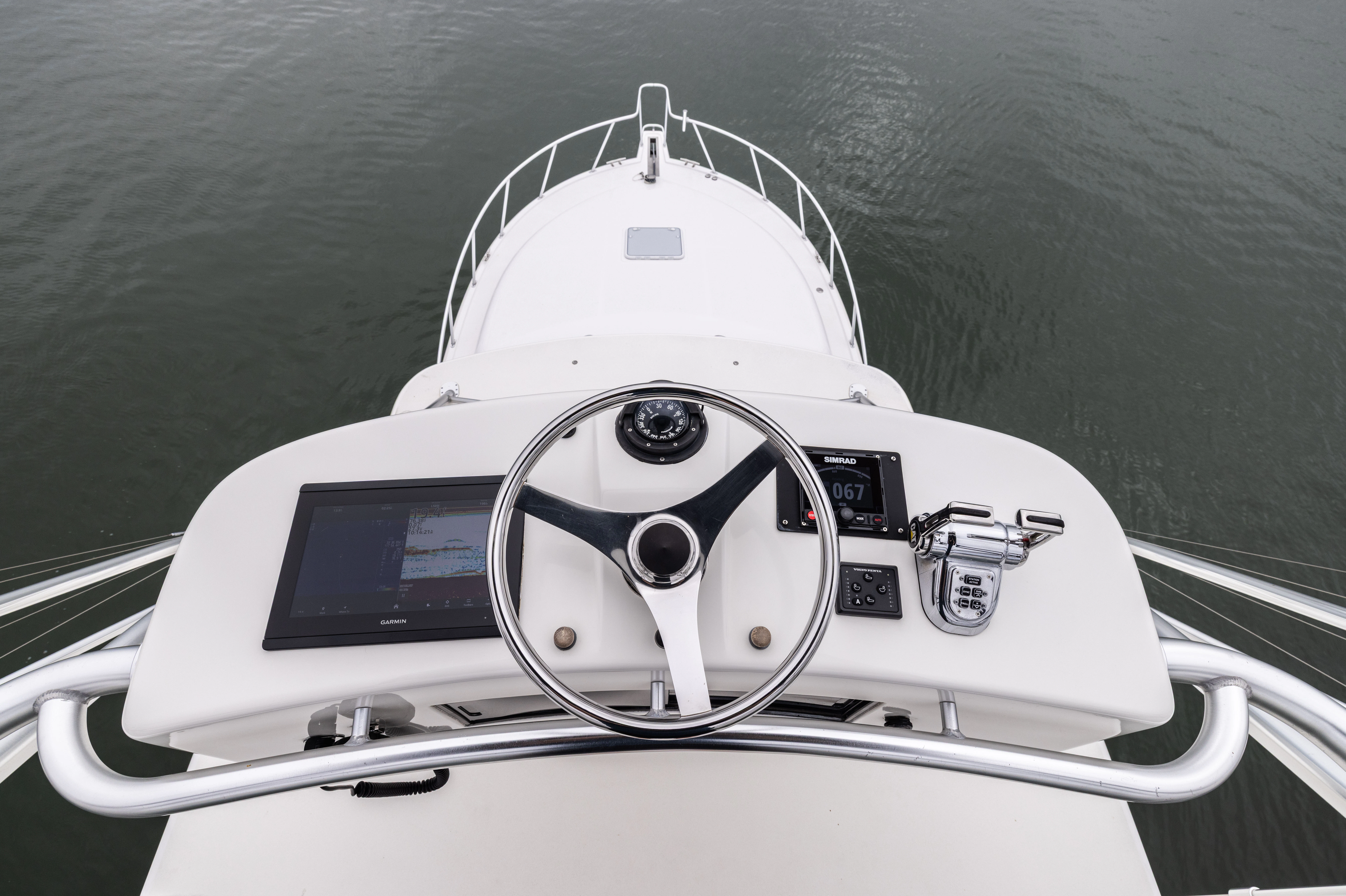a white car with a steering wheel aboard SHOW TIME Yacht for Sale