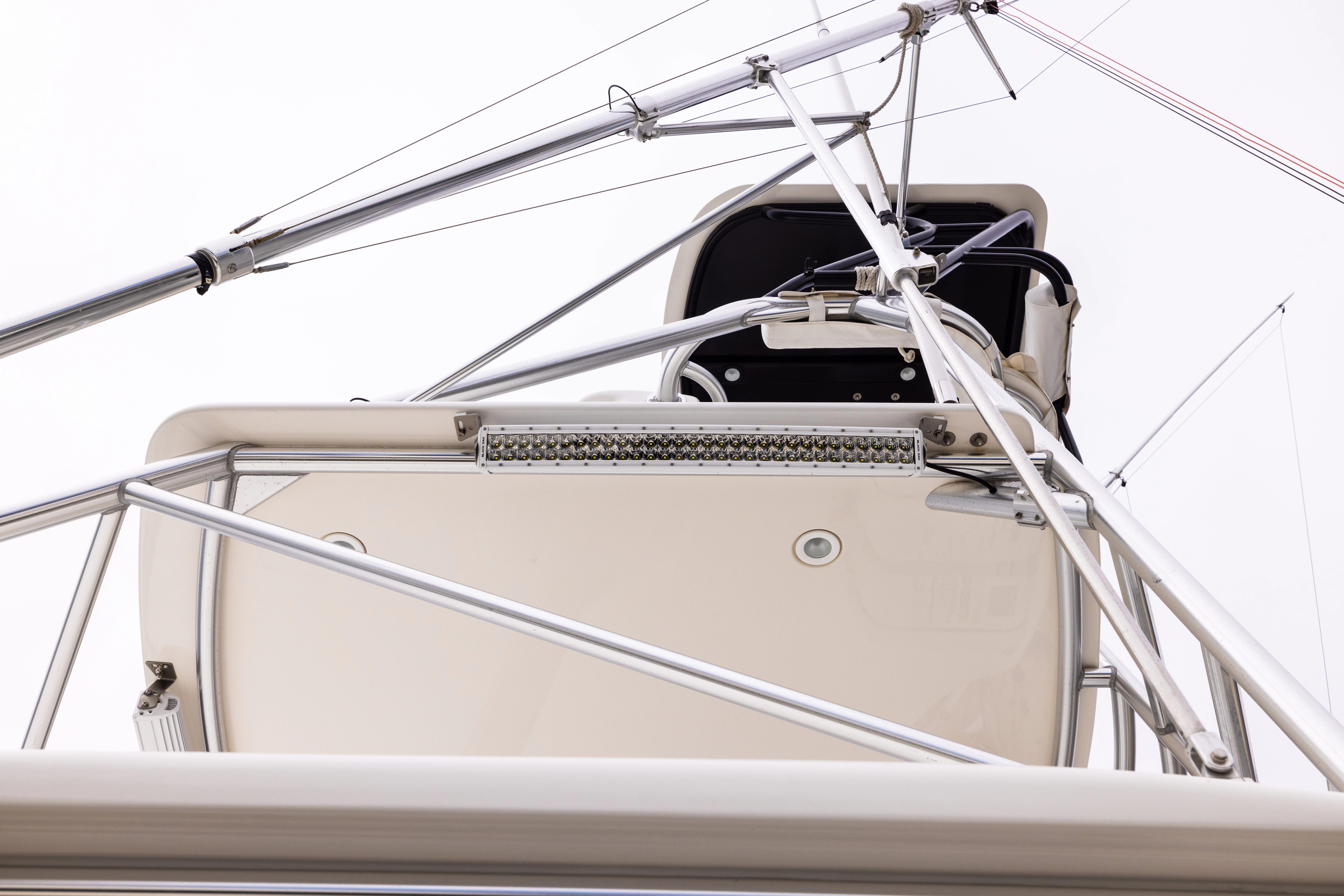a white boat with a black frame aboard SHOW TIME Yacht for Sale