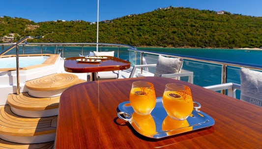 a table with drinks on it aboard SCOTT FREE Yacht for Charter