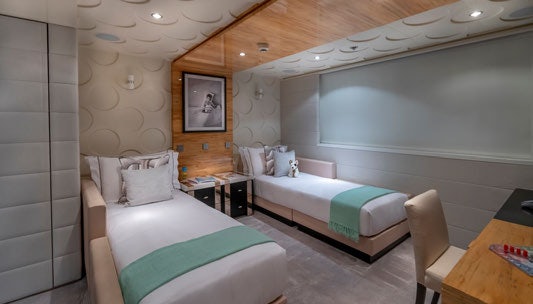 a room with two beds aboard SCOTT FREE Yacht for Charter