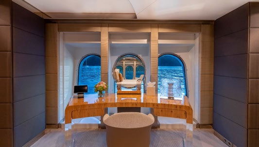 a room with a table and chairs aboard SCOTT FREE Yacht for Charter