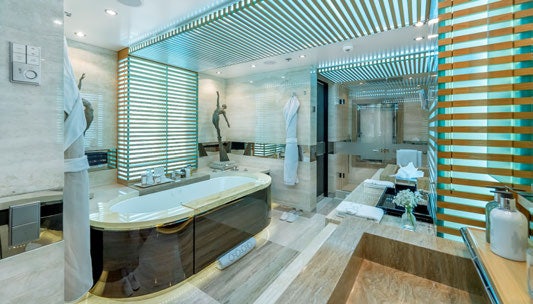 a bathroom with a large tub aboard SCOTT FREE Yacht for Charter