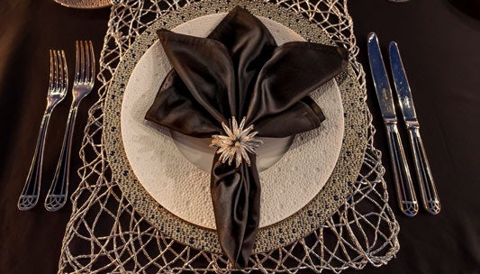 a flower on a plate aboard SCOTT FREE Yacht for Charter