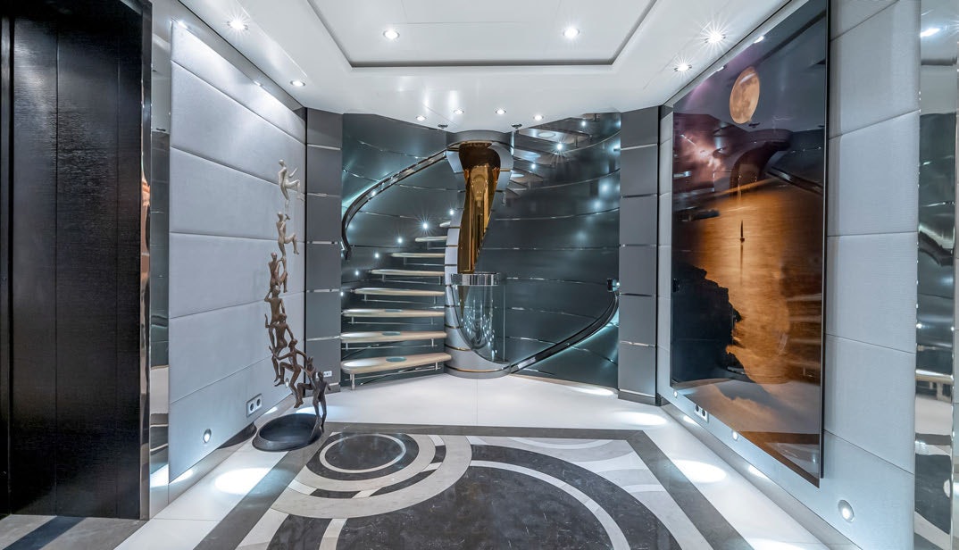 a large room with glass walls aboard SCOTT FREE Yacht for Charter