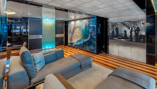 a room with a large painting aboard SCOTT FREE Yacht for Charter