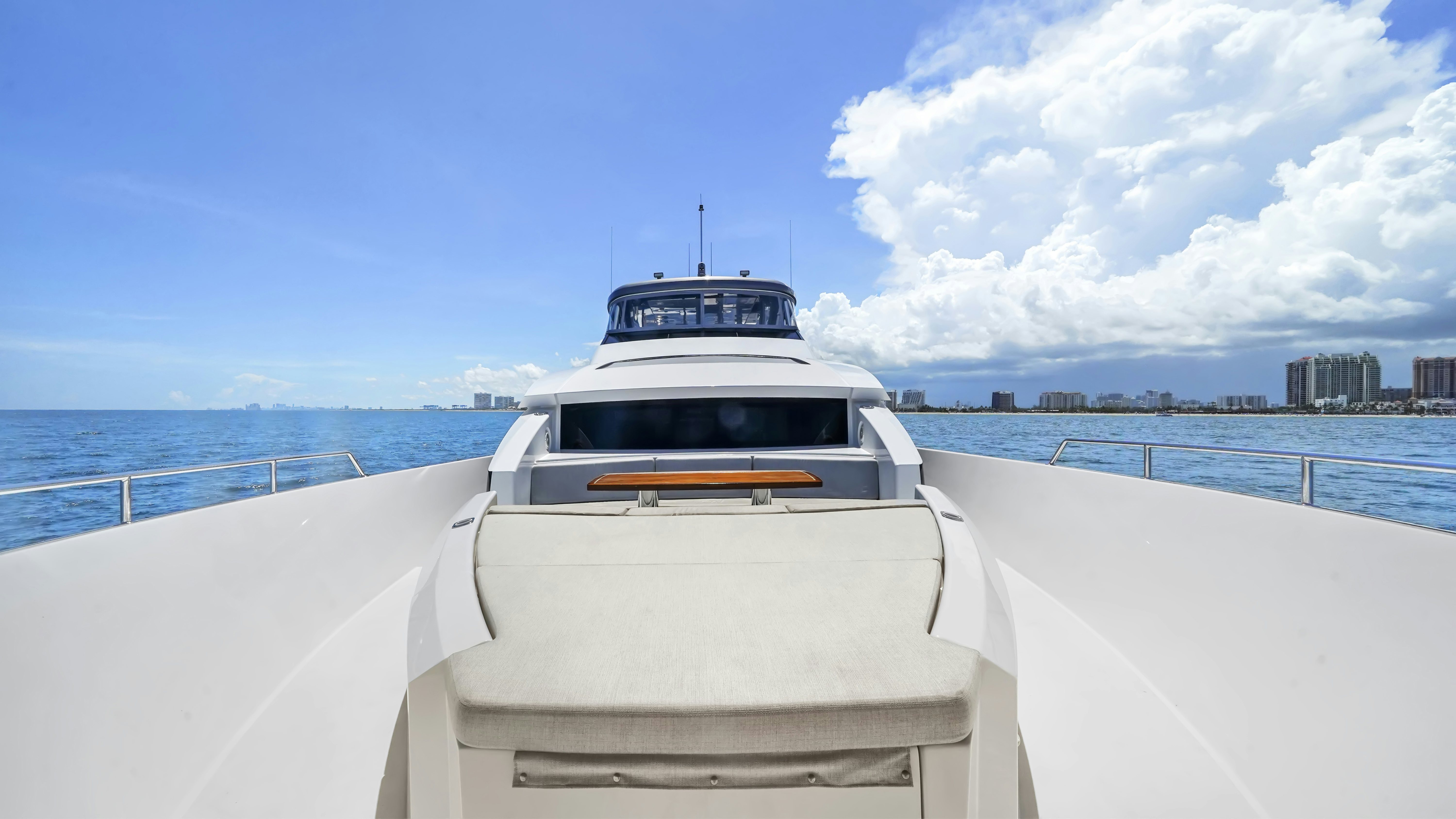 a white yacht on a body of water aboard SURPLUS LINES Yacht for Sale