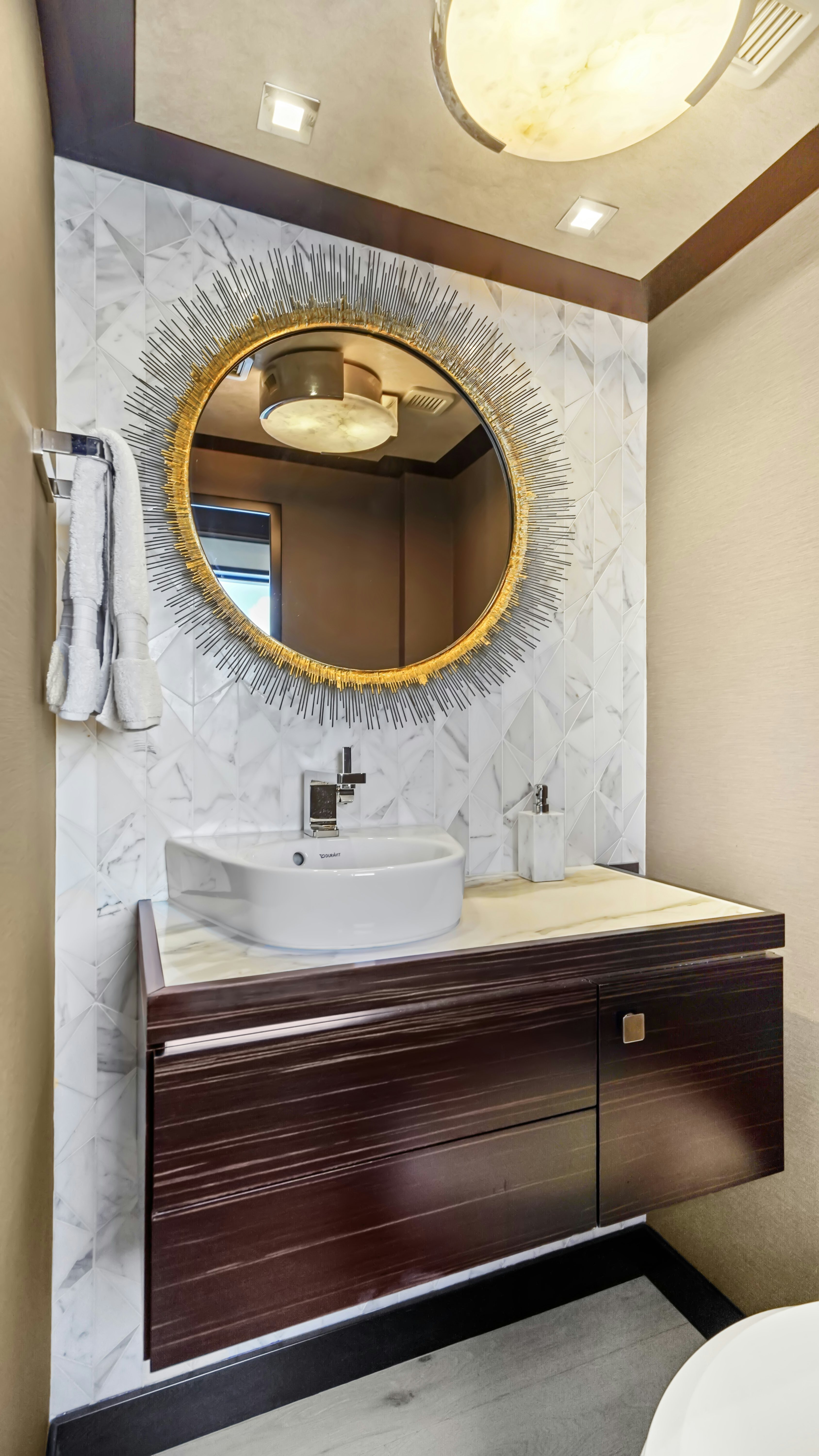 a bathroom with a large mirror aboard SURPLUS LINES Yacht for Sale