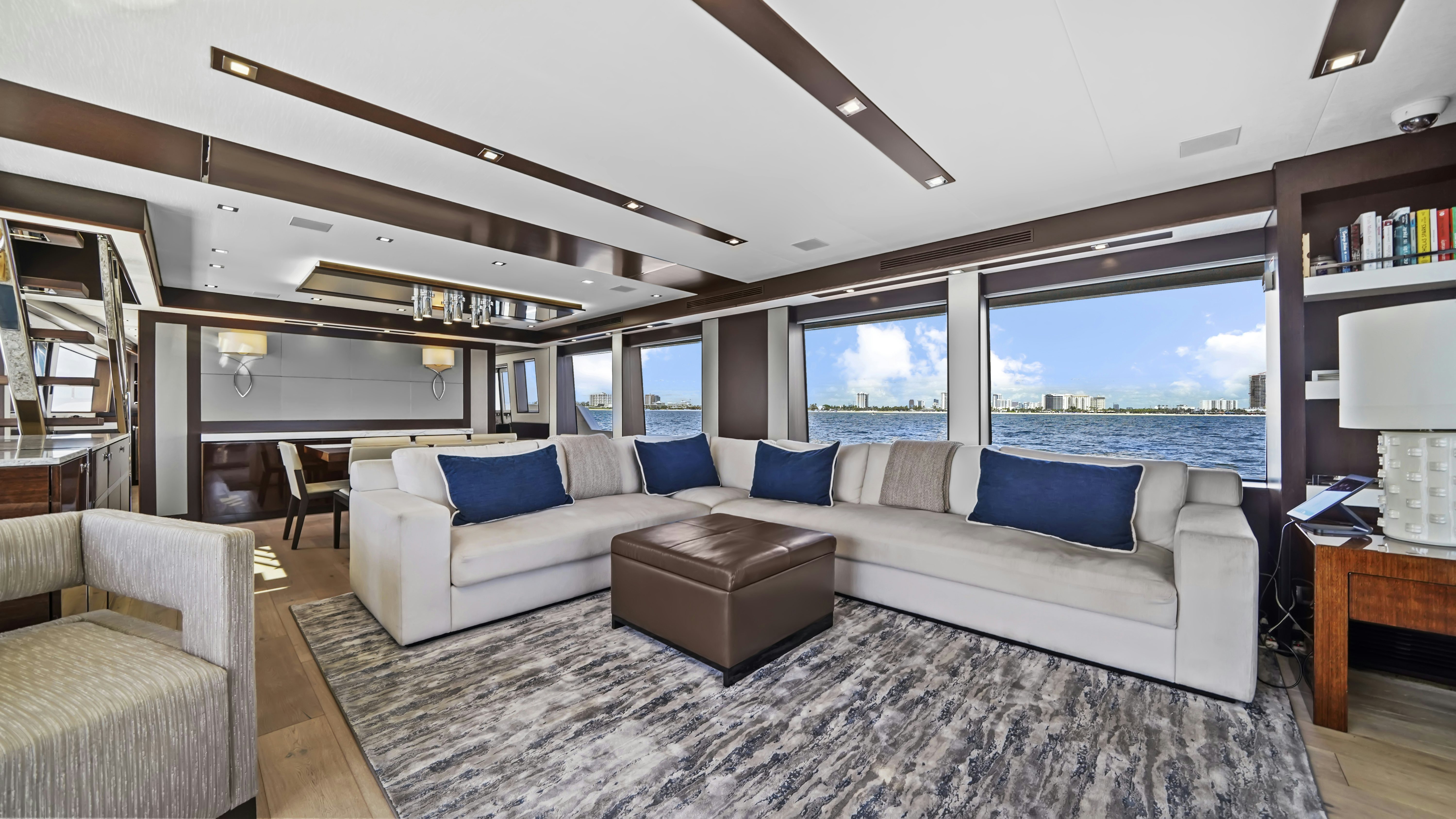 a living room with a large sofa aboard SURPLUS LINES Yacht for Sale