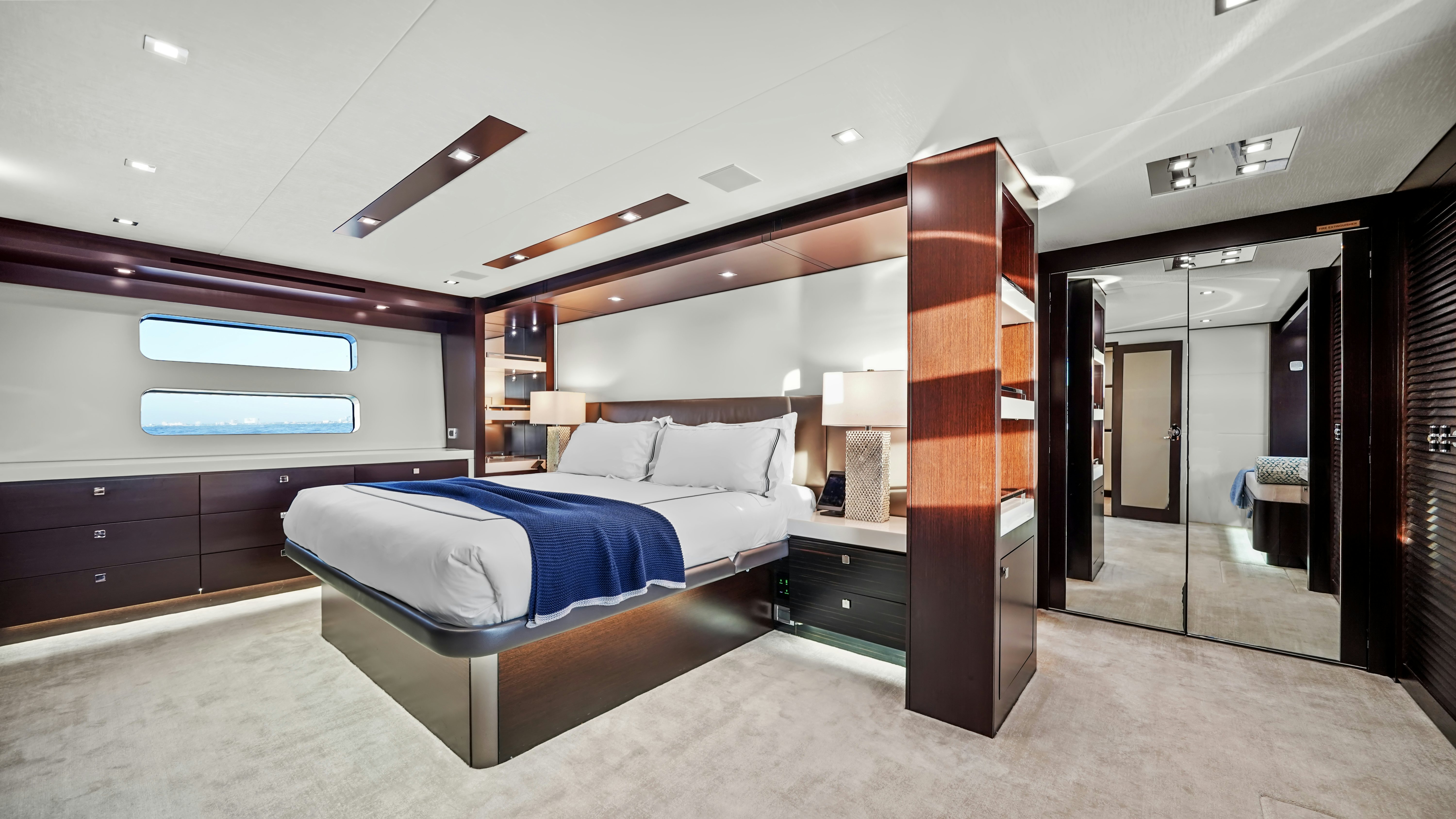 a large bedroom with a large bed aboard SURPLUS LINES Yacht for Sale