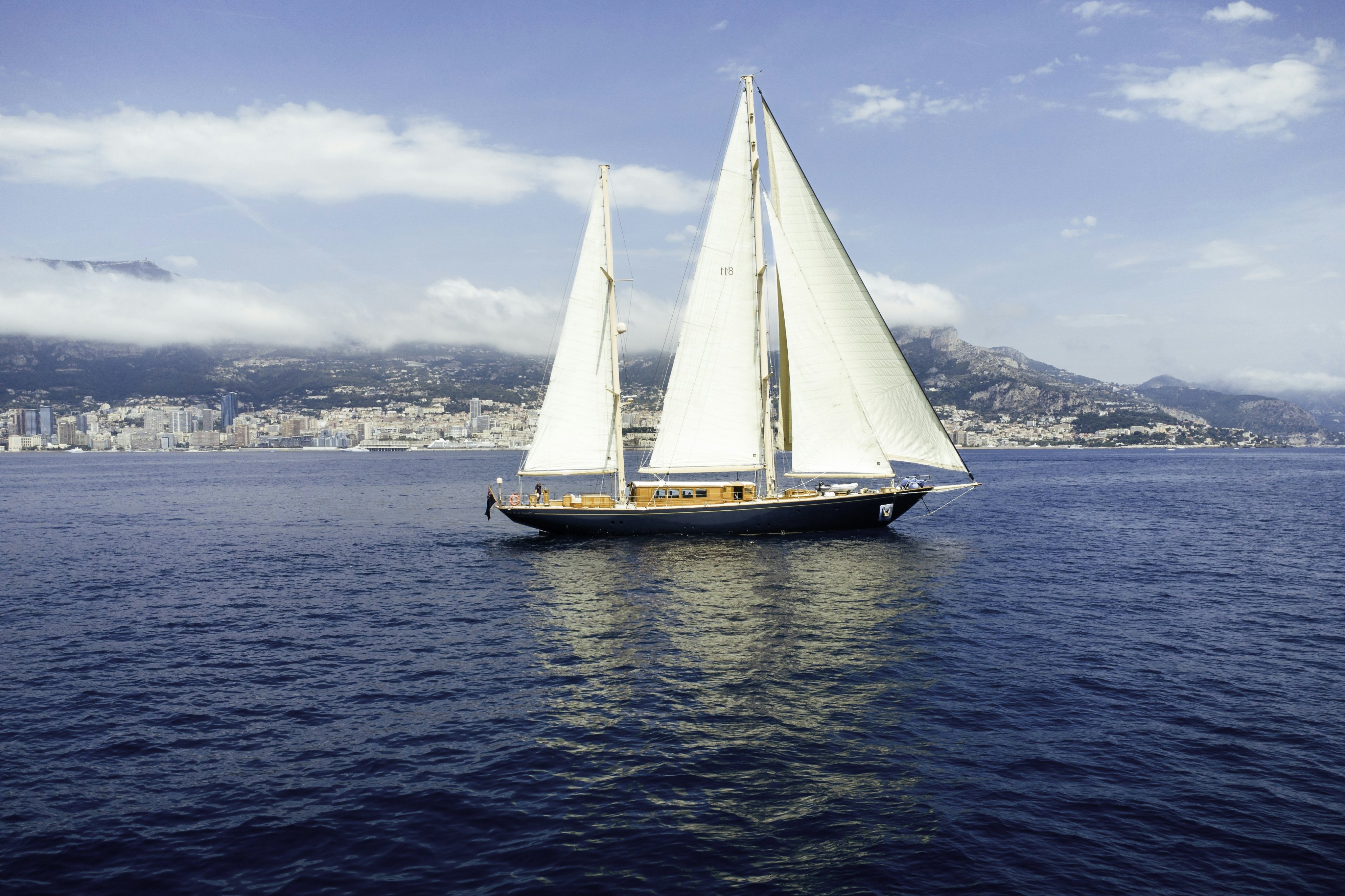 a sailboat on the water aboard STRANGERS IN THE NIGHT Yacht for Sale