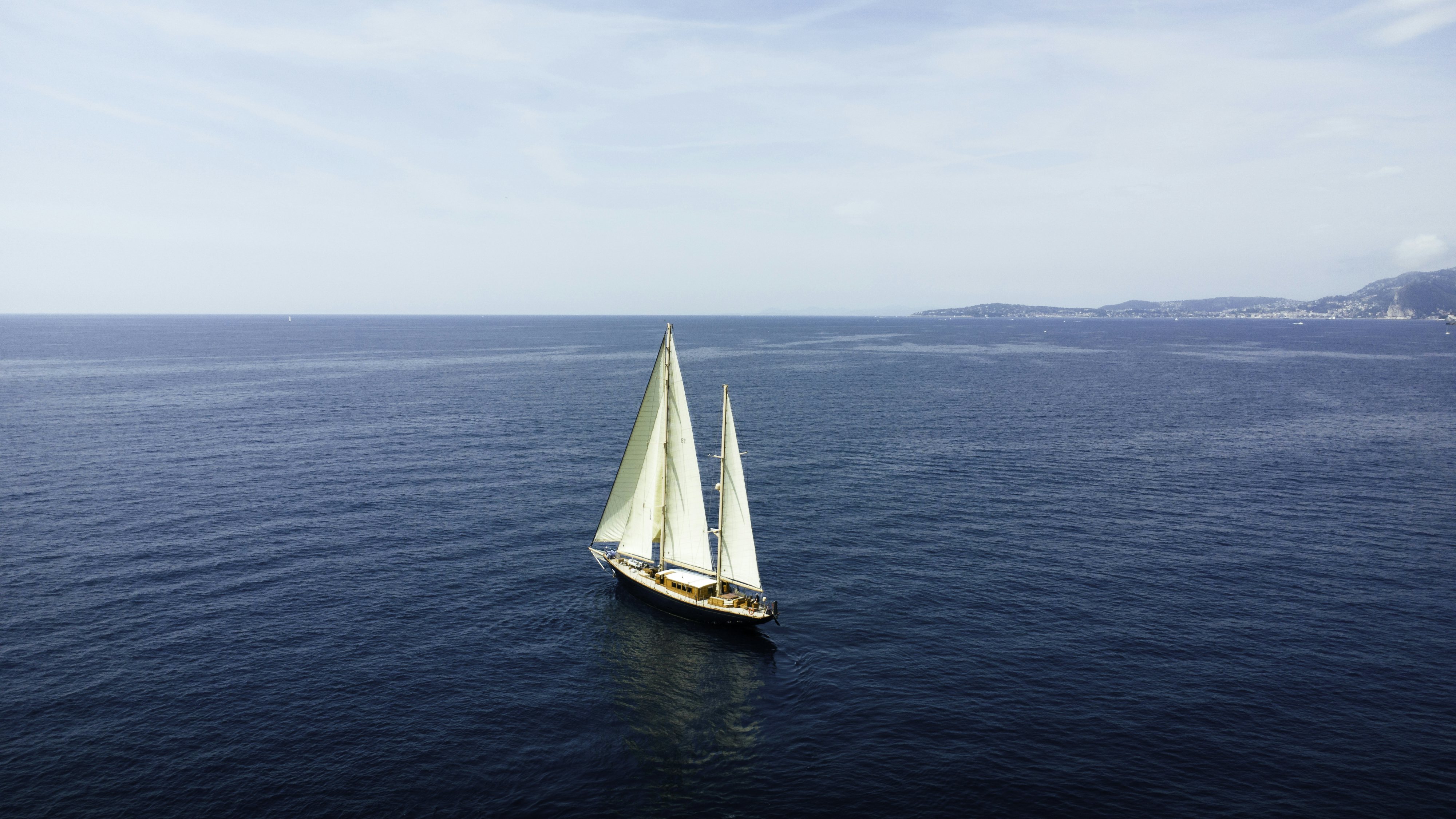 a sailboat on the water aboard STRANGERS IN THE NIGHT Yacht for Sale