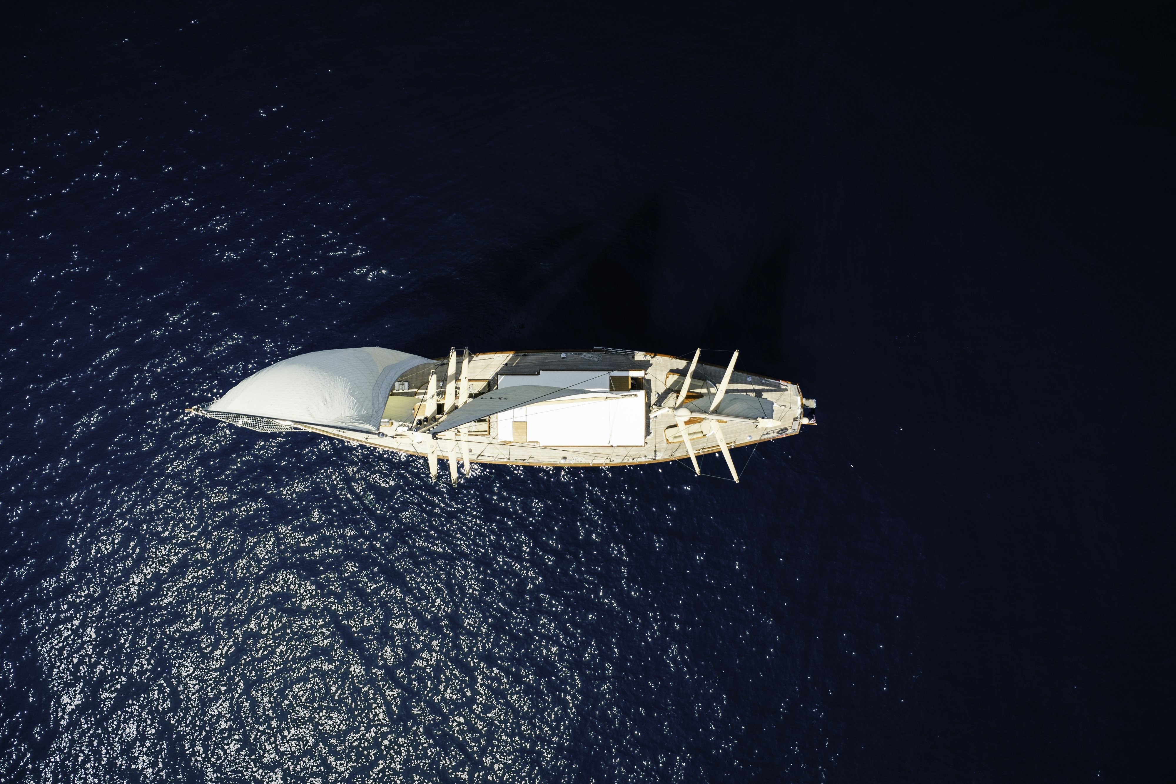 a space shuttle in space aboard STRANGERS IN THE NIGHT Yacht for Sale