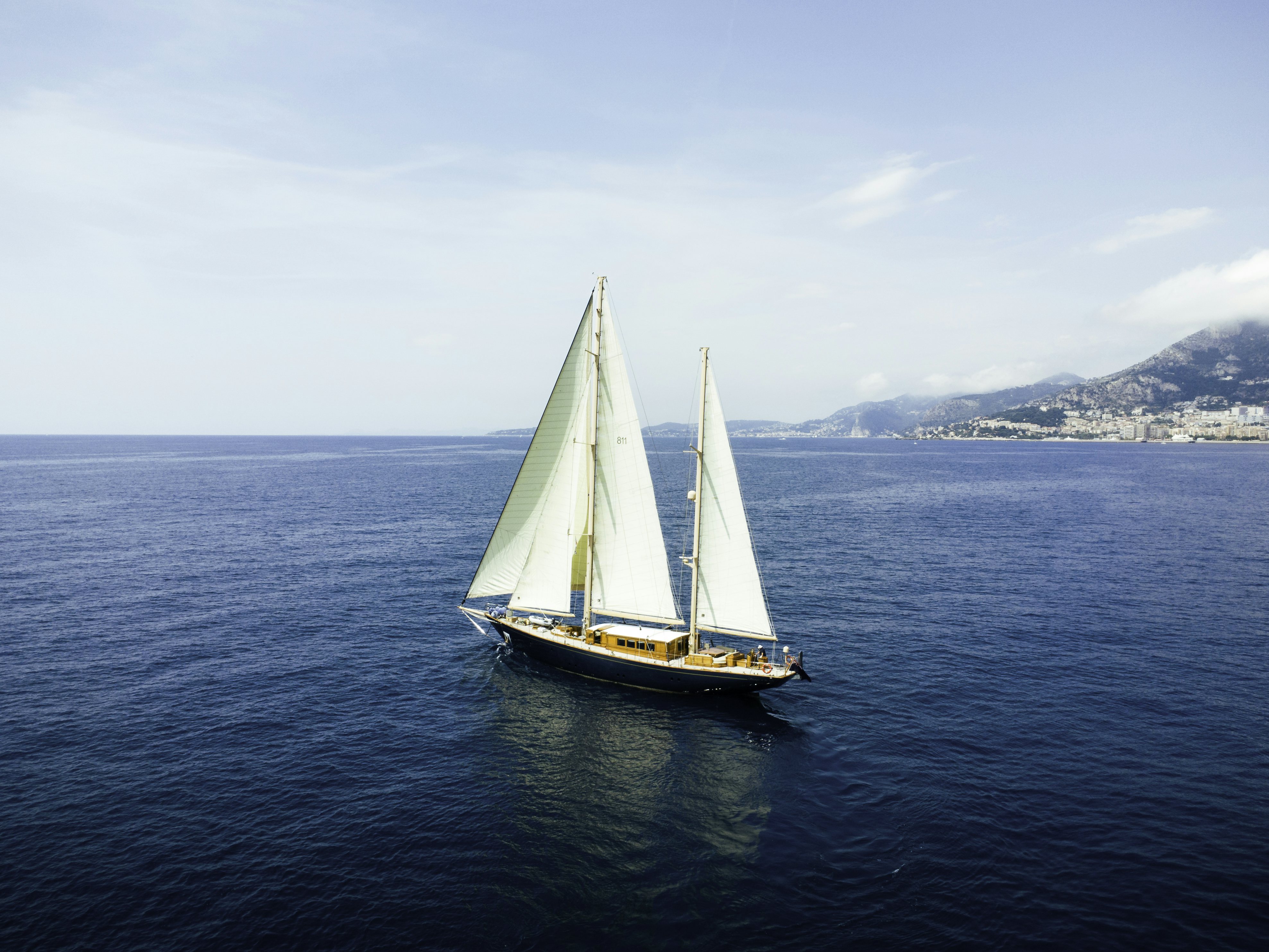 a sailboat on the water aboard STRANGERS IN THE NIGHT Yacht for Sale