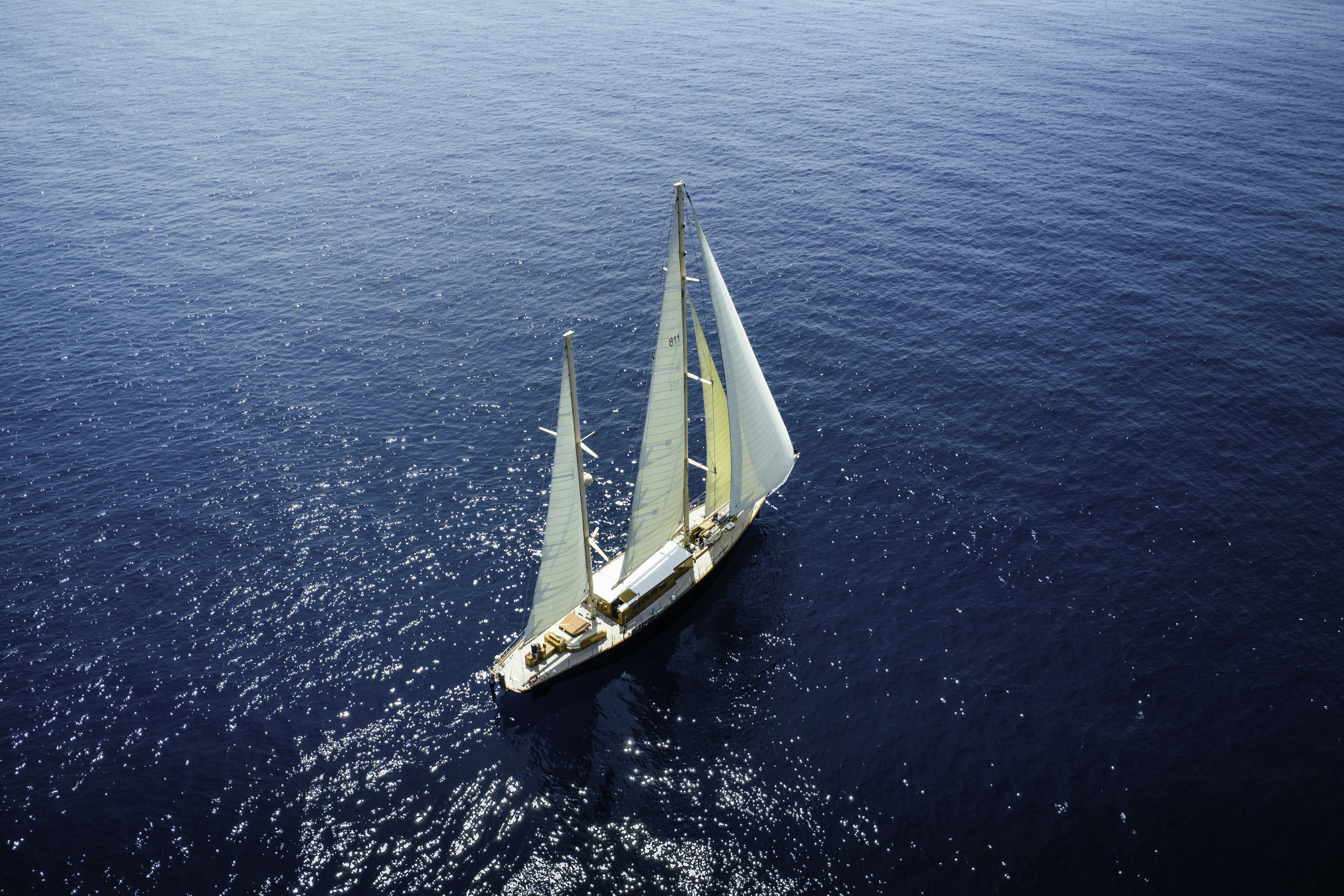 a boat on the water aboard STRANGERS IN THE NIGHT Yacht for Sale