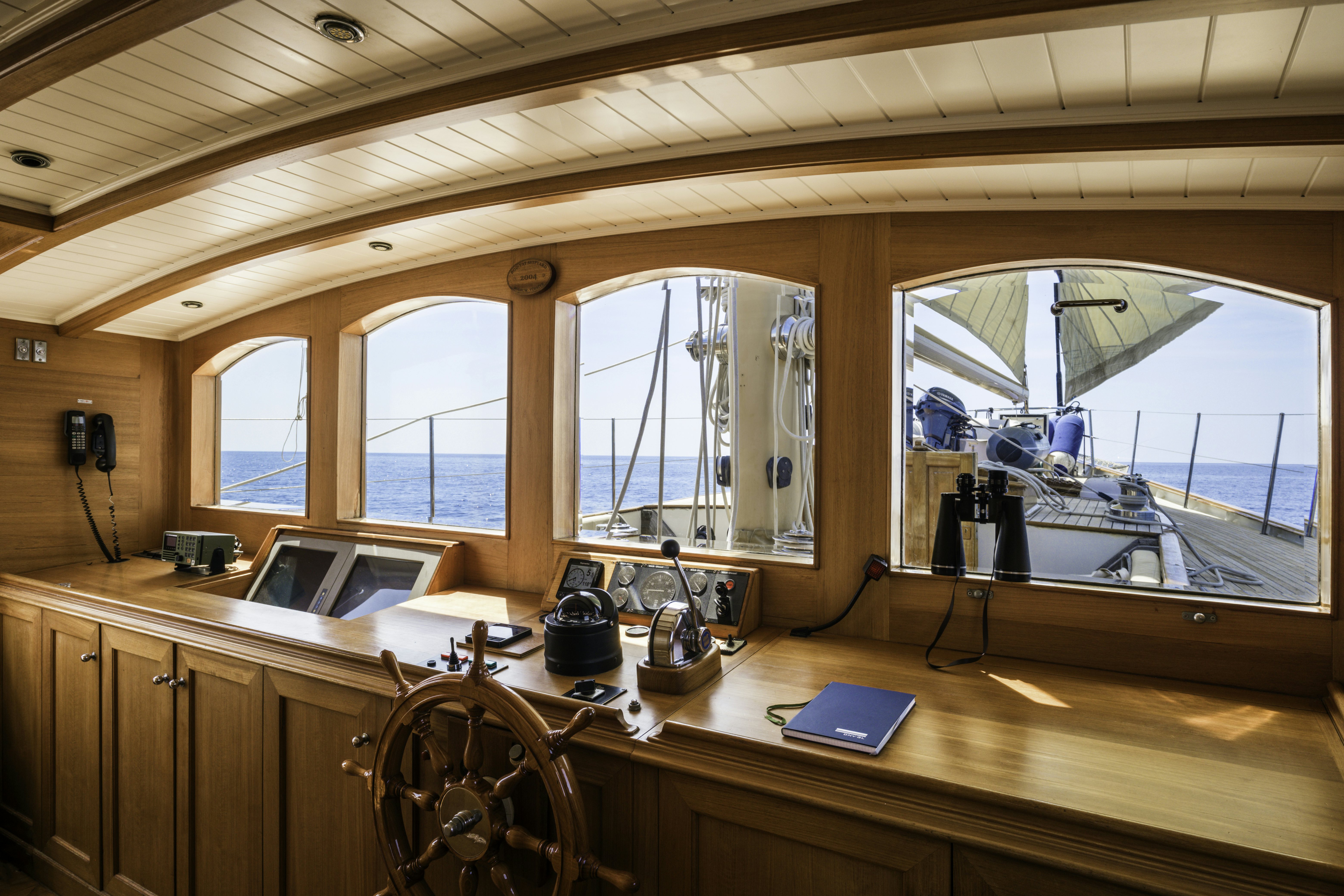 a room with a desk and a computer aboard STRANGERS IN THE NIGHT Yacht for Sale