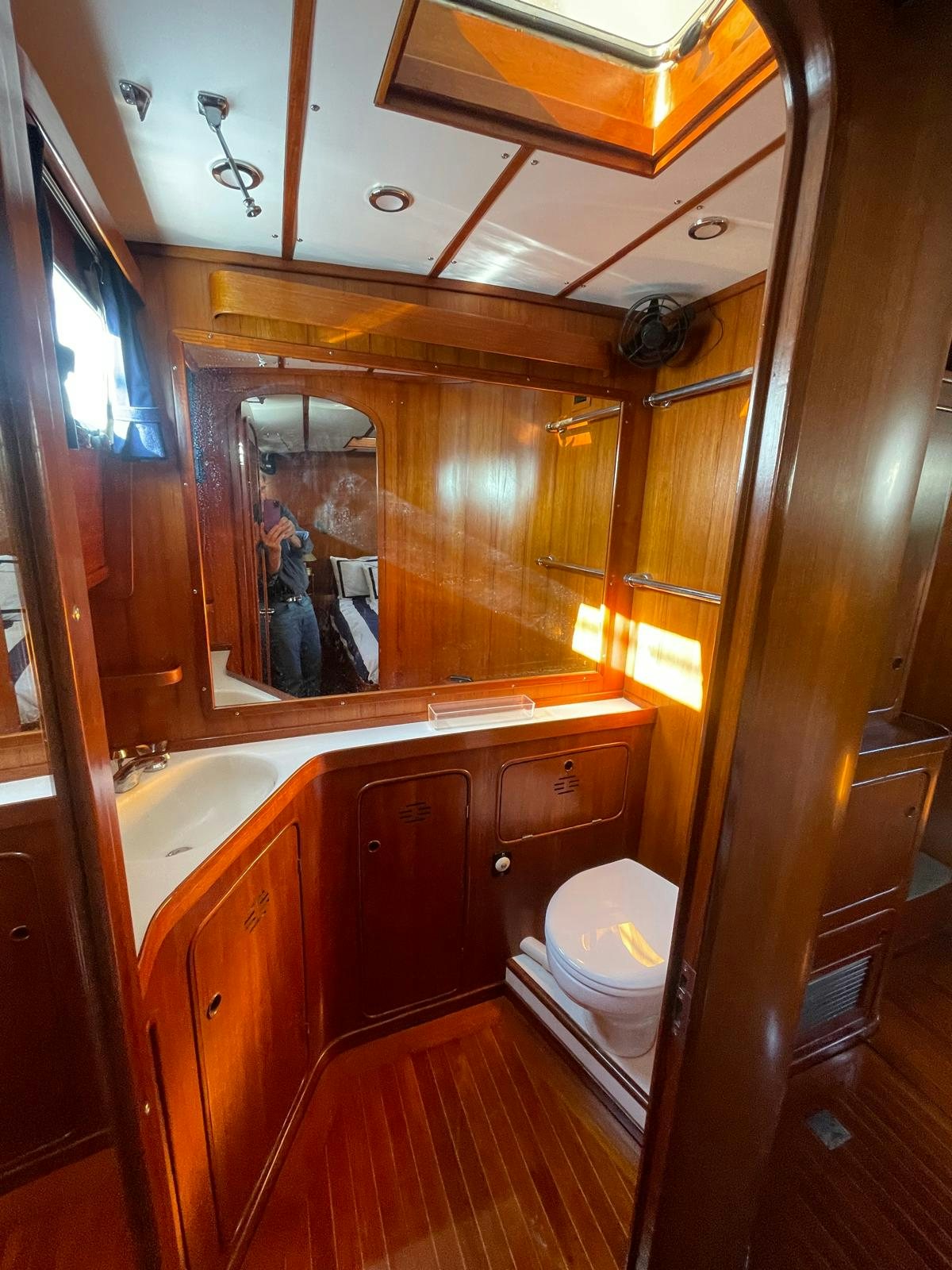 a bathroom with a mirror aboard SOUTHERLY Yacht for Sale