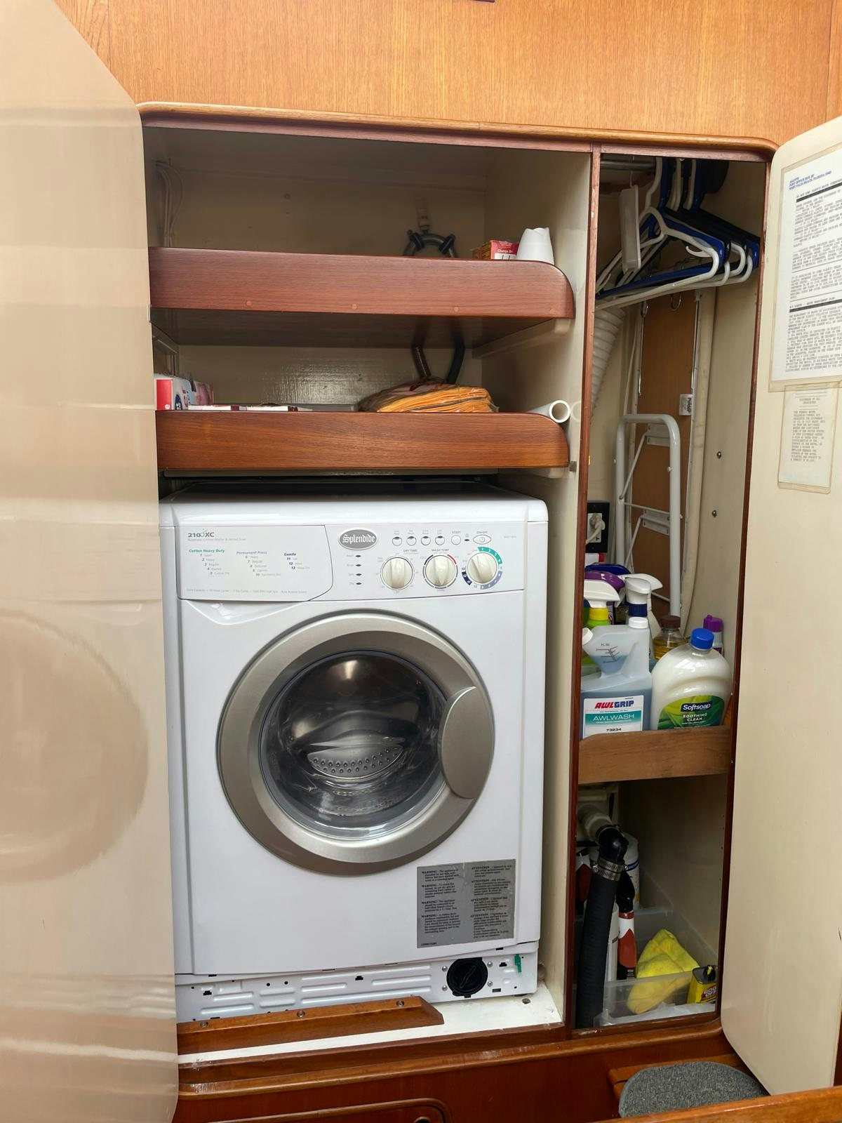 a white washing machine aboard SOUTHERLY Yacht for Sale