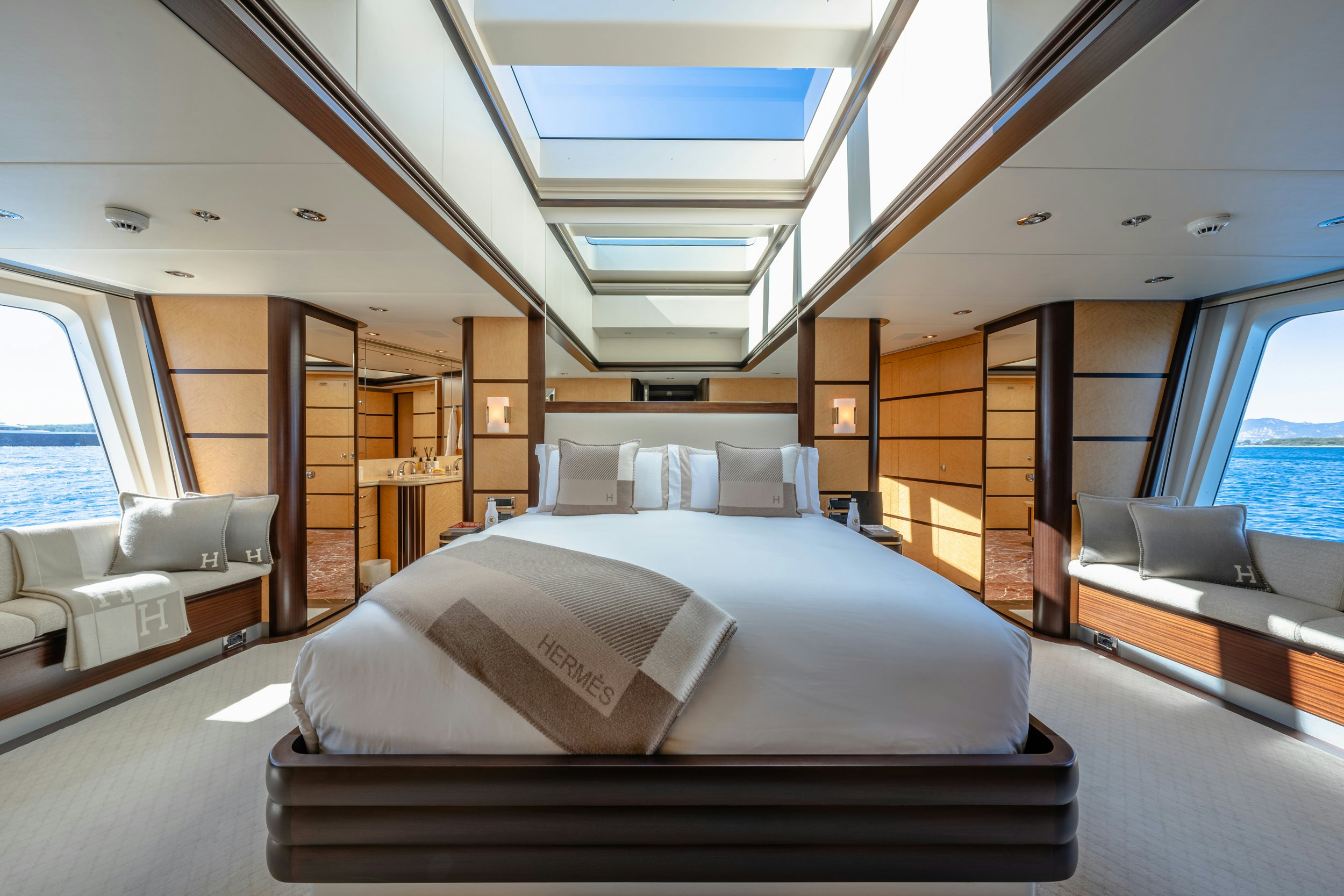 a bed in a room aboard GLADIATOR Yacht for Charter