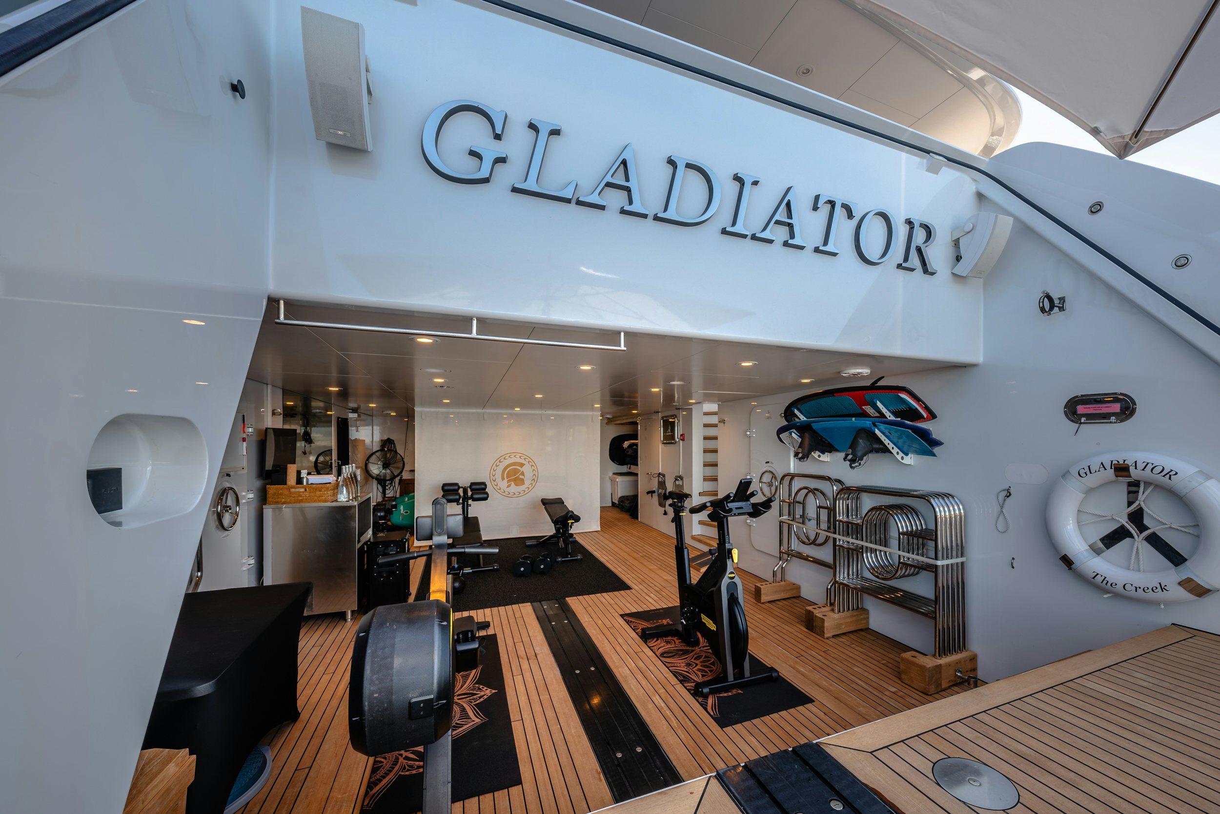 a large room with a large sign aboard GLADIATOR Yacht for Charter