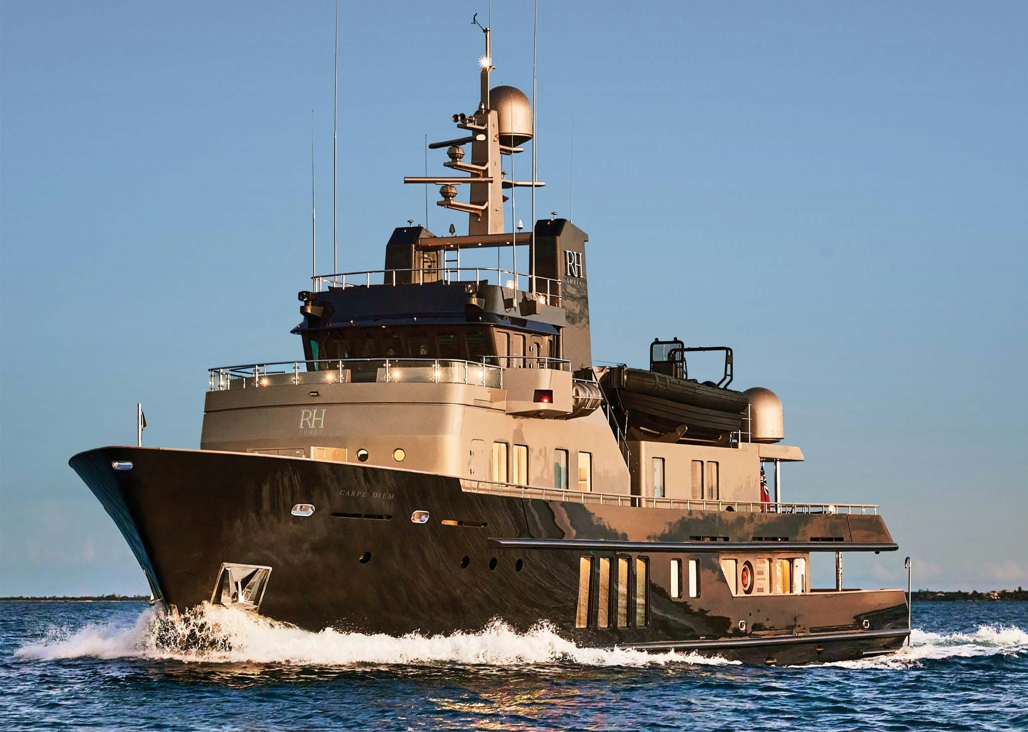a large ship in the water aboard RH THREE Yacht for Charter