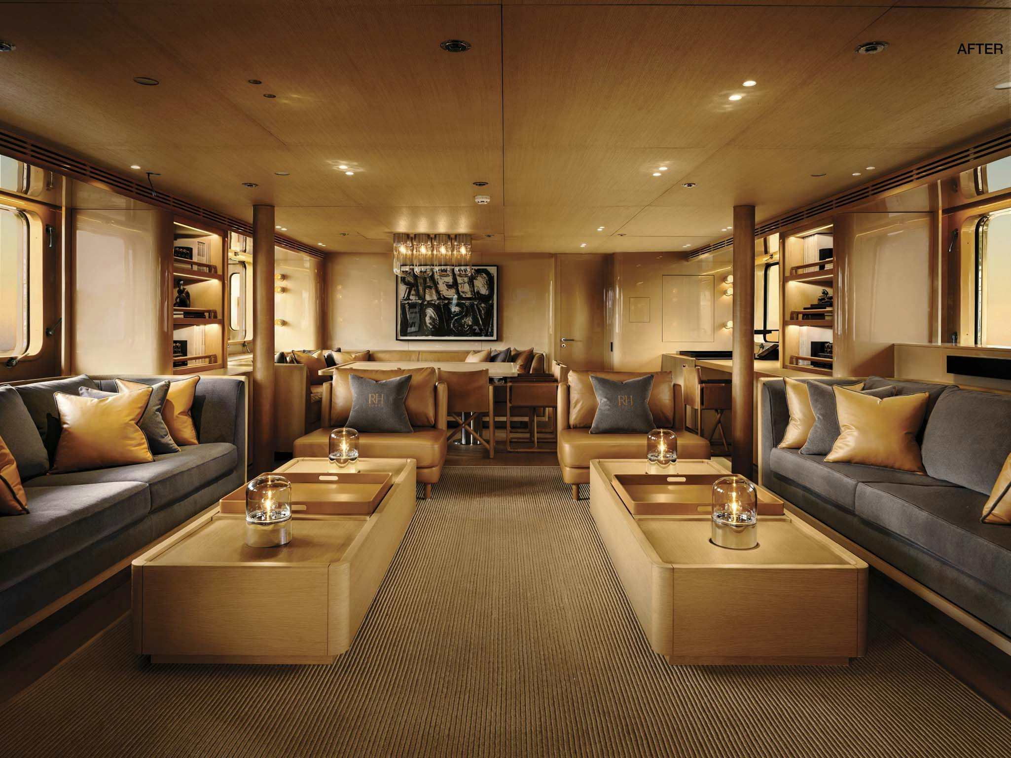 a living room with a couch and a coffee table aboard RH THREE Yacht for Charter