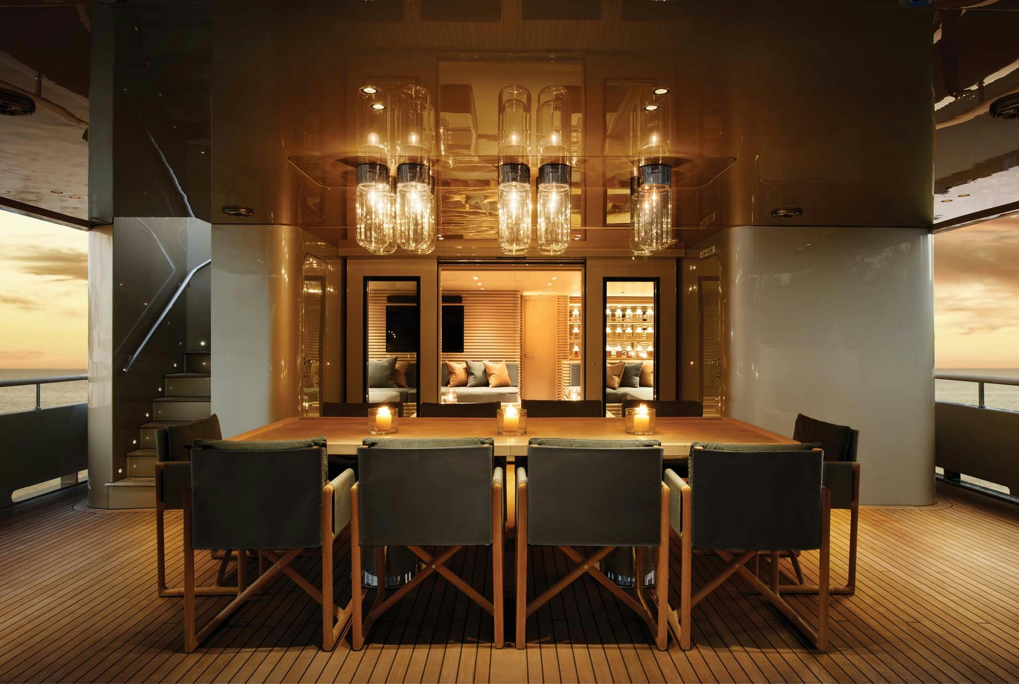 a bar with a table and chairs aboard RH THREE Yacht for Charter