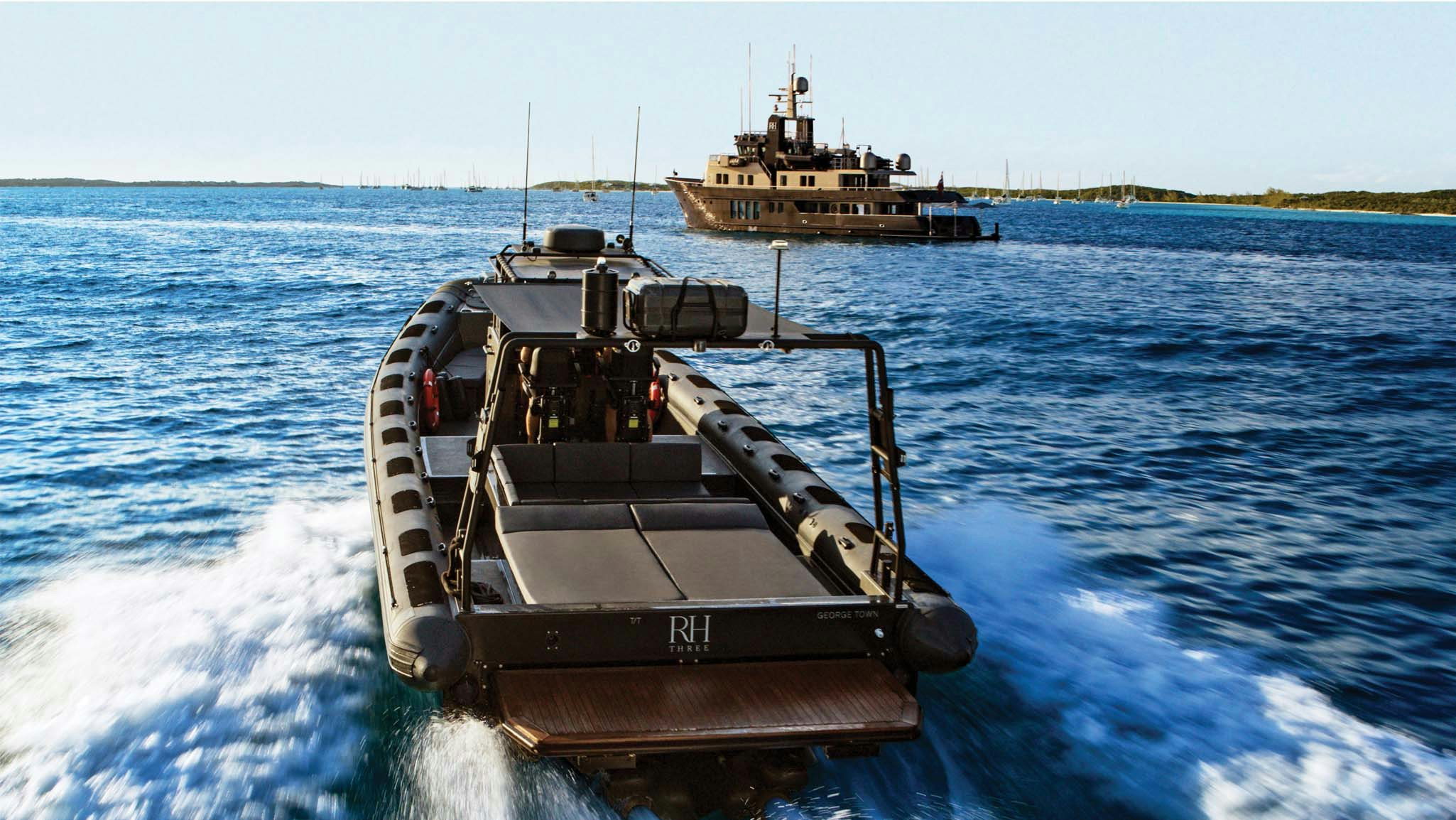 a boat on the water aboard RH THREE Yacht for Charter
