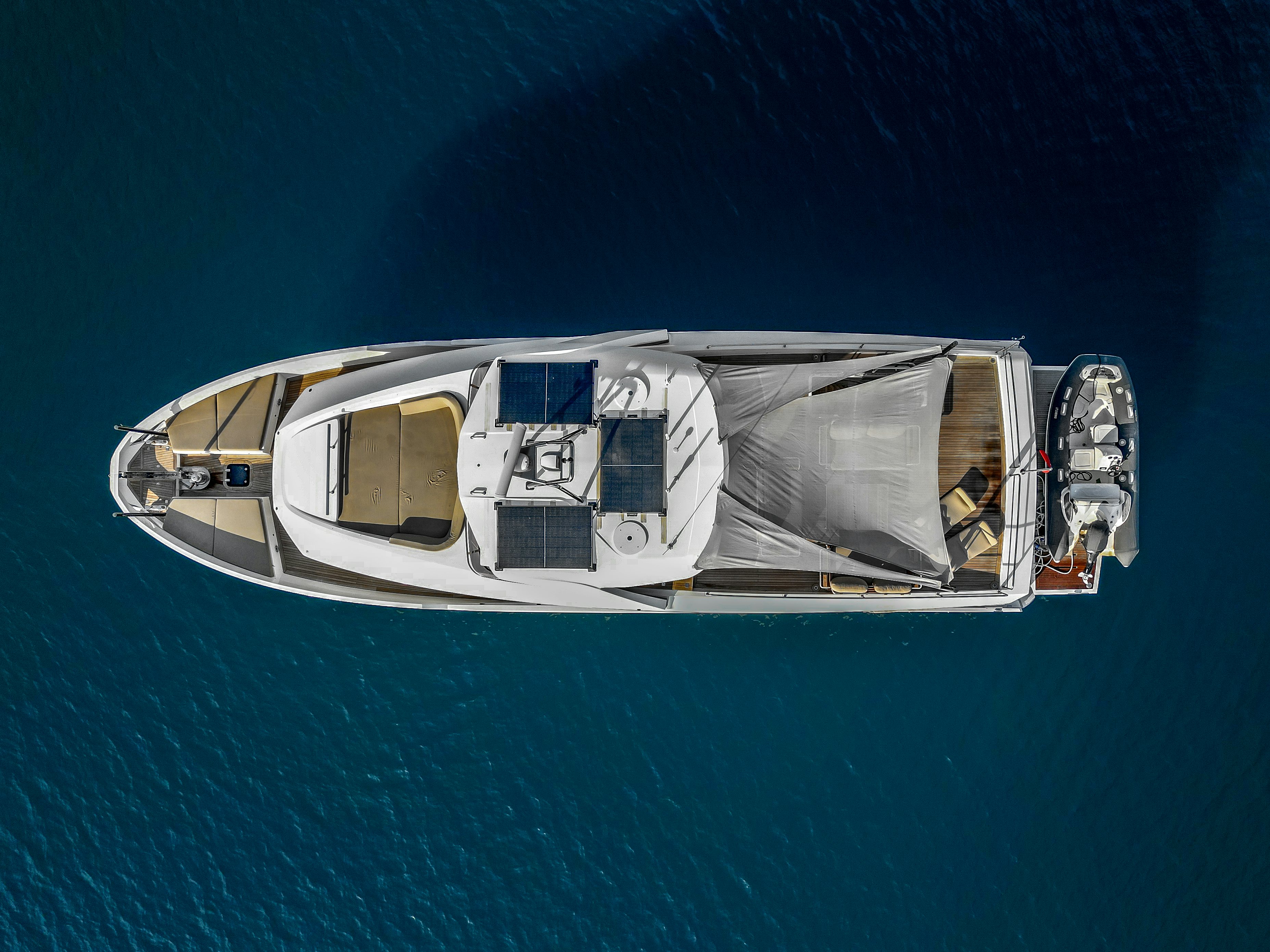 a white boat in the water aboard LITTLE MERMAID Yacht for Sale