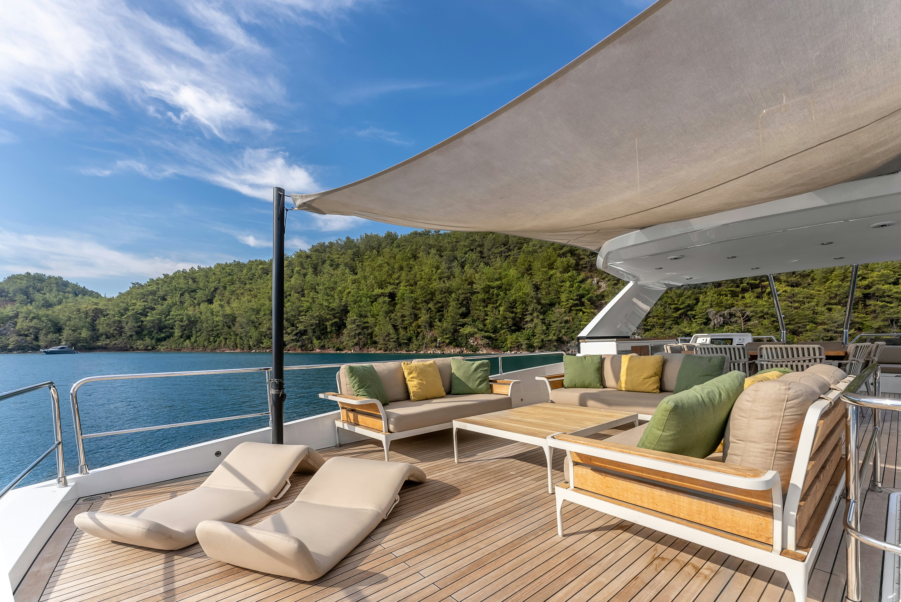 a deck with a couch and a pool aboard LITTLE MERMAID Yacht for Sale