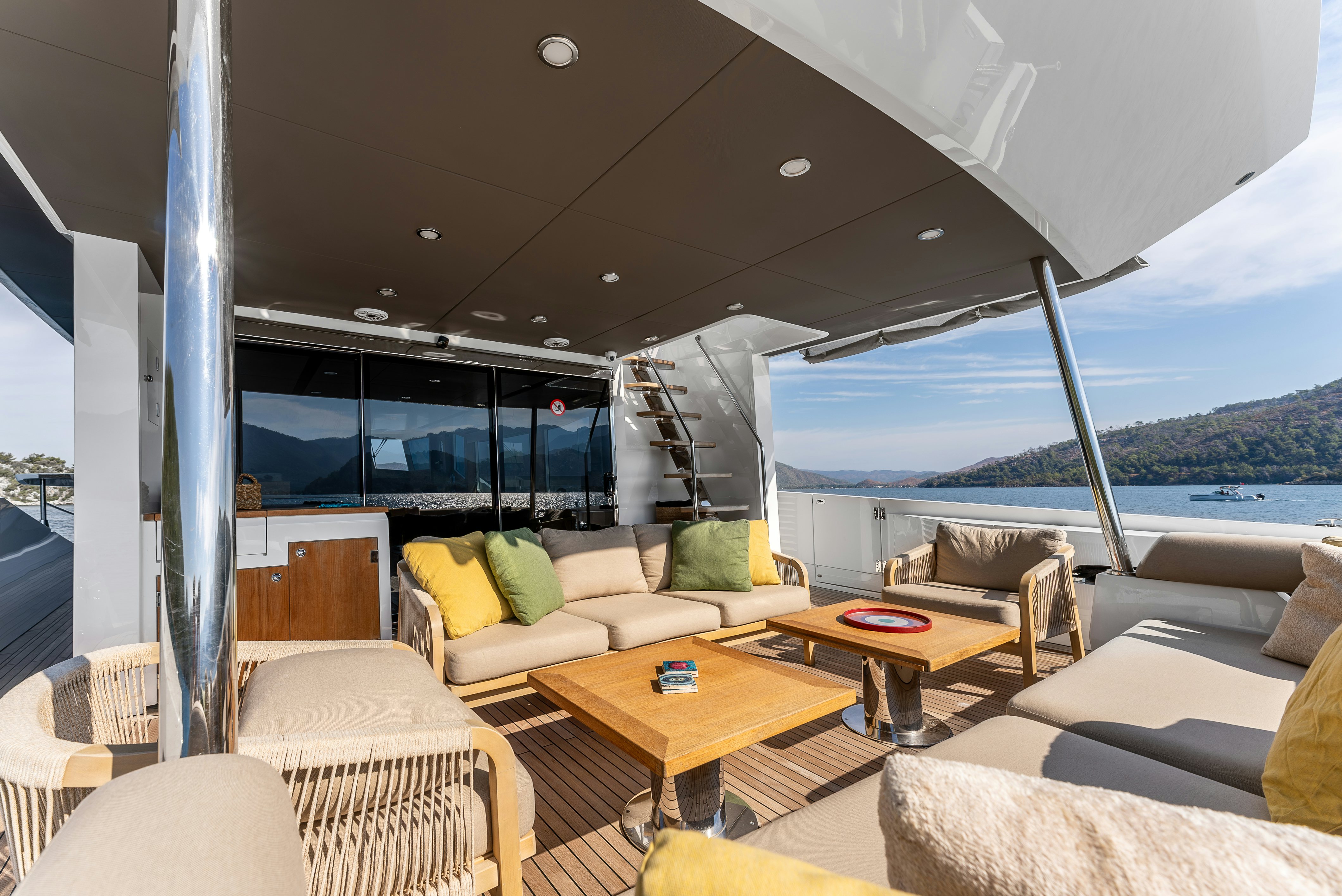 a living room with a large window aboard LITTLE MERMAID Yacht for Sale
