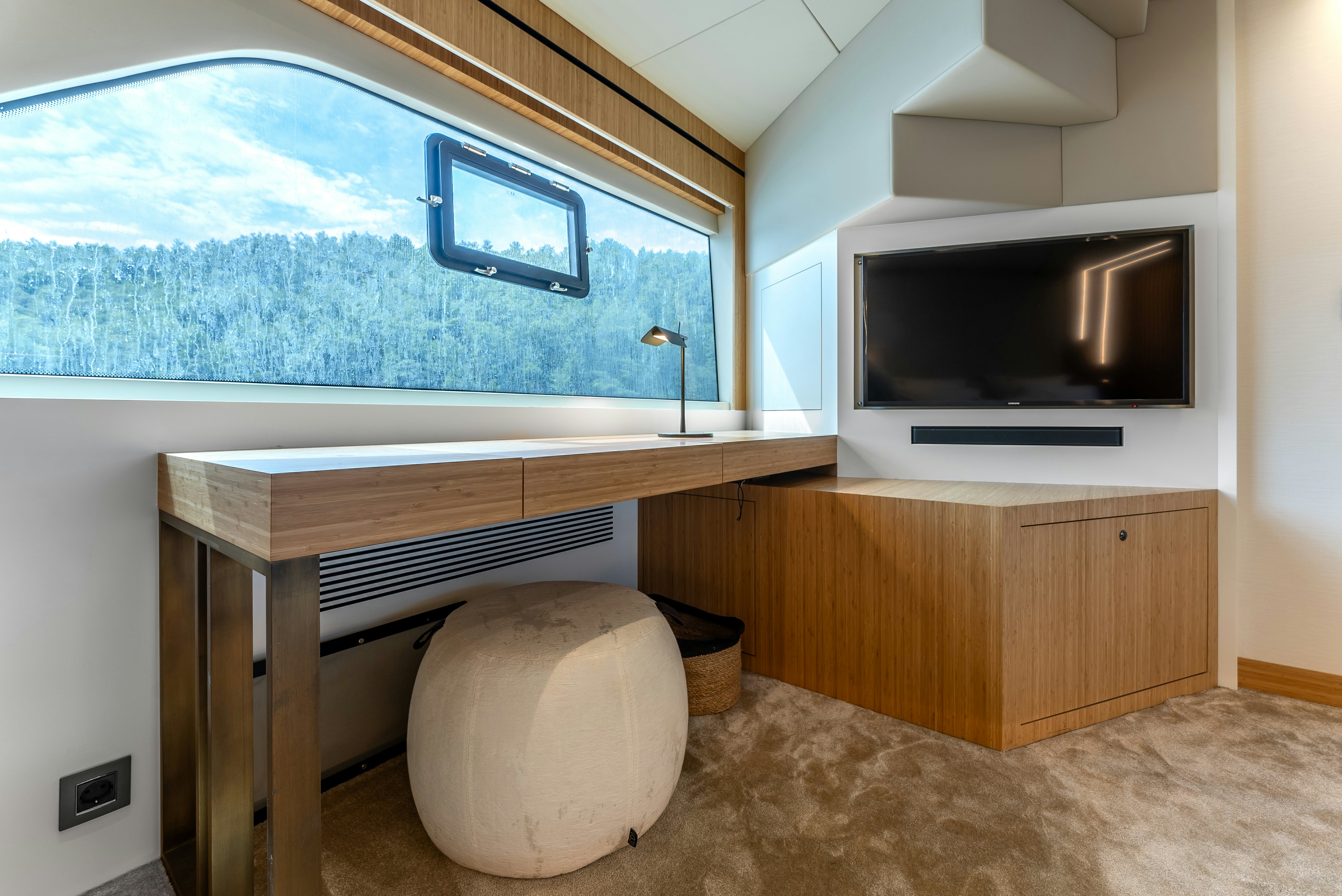 a room with a television and a couch aboard LITTLE MERMAID Yacht for Sale