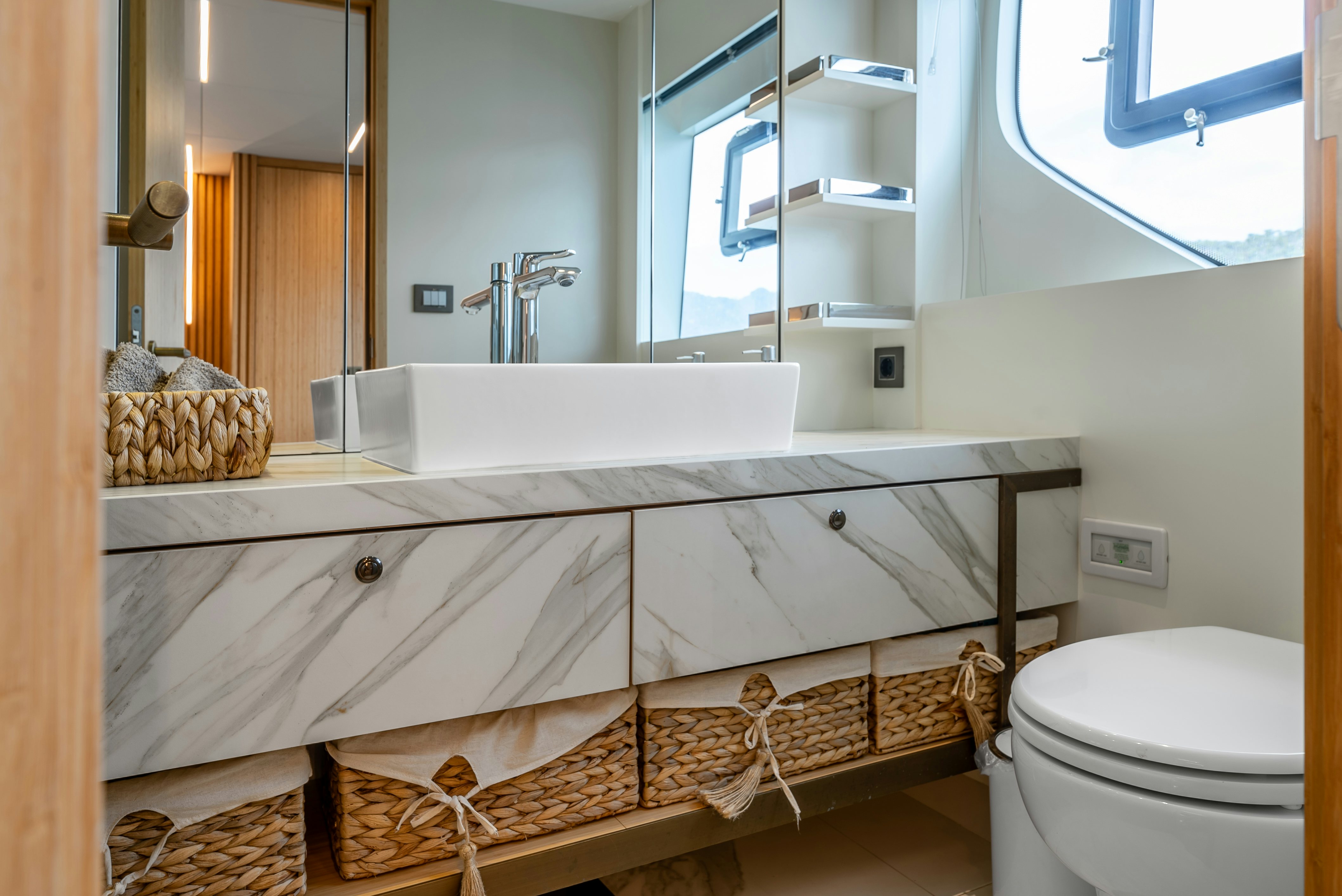 a bathroom with a tub sink and toilet aboard LITTLE MERMAID Yacht for Sale