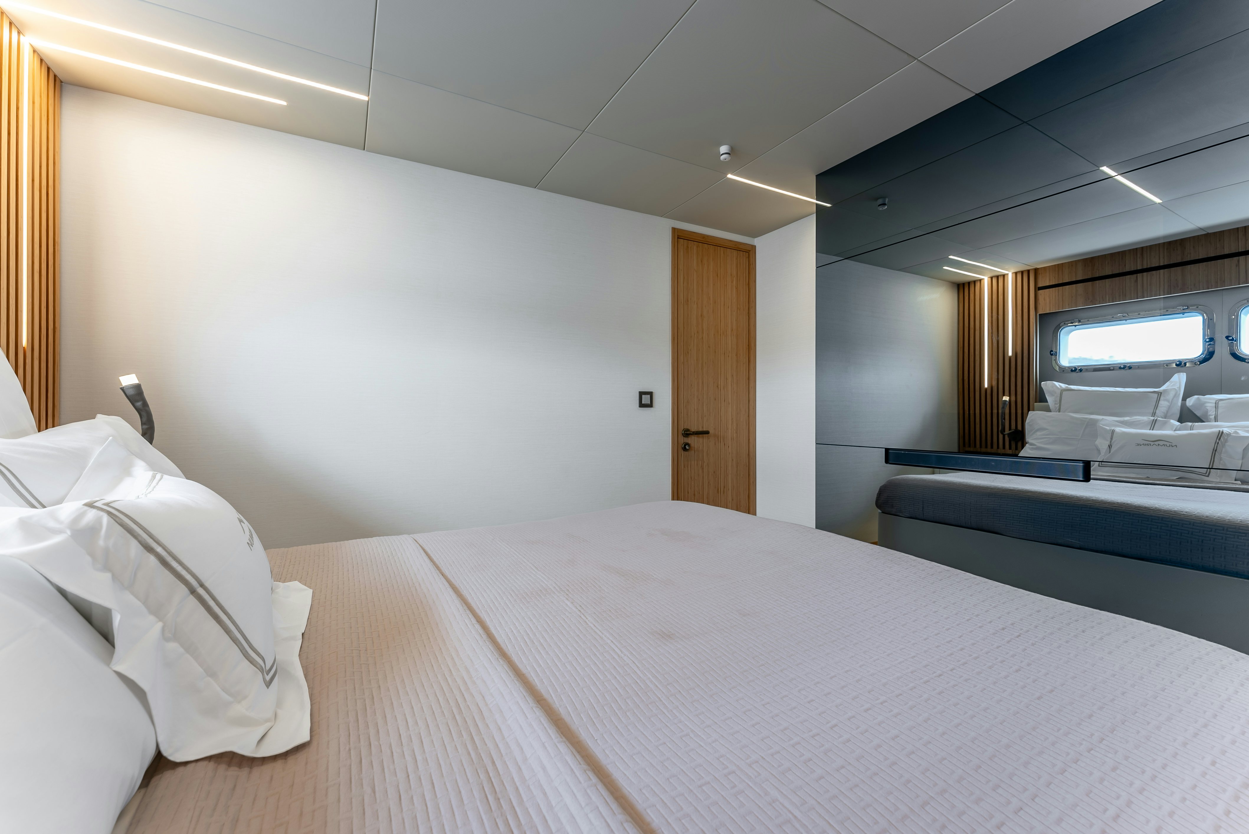 a large bed in a room aboard LITTLE MERMAID Yacht for Sale