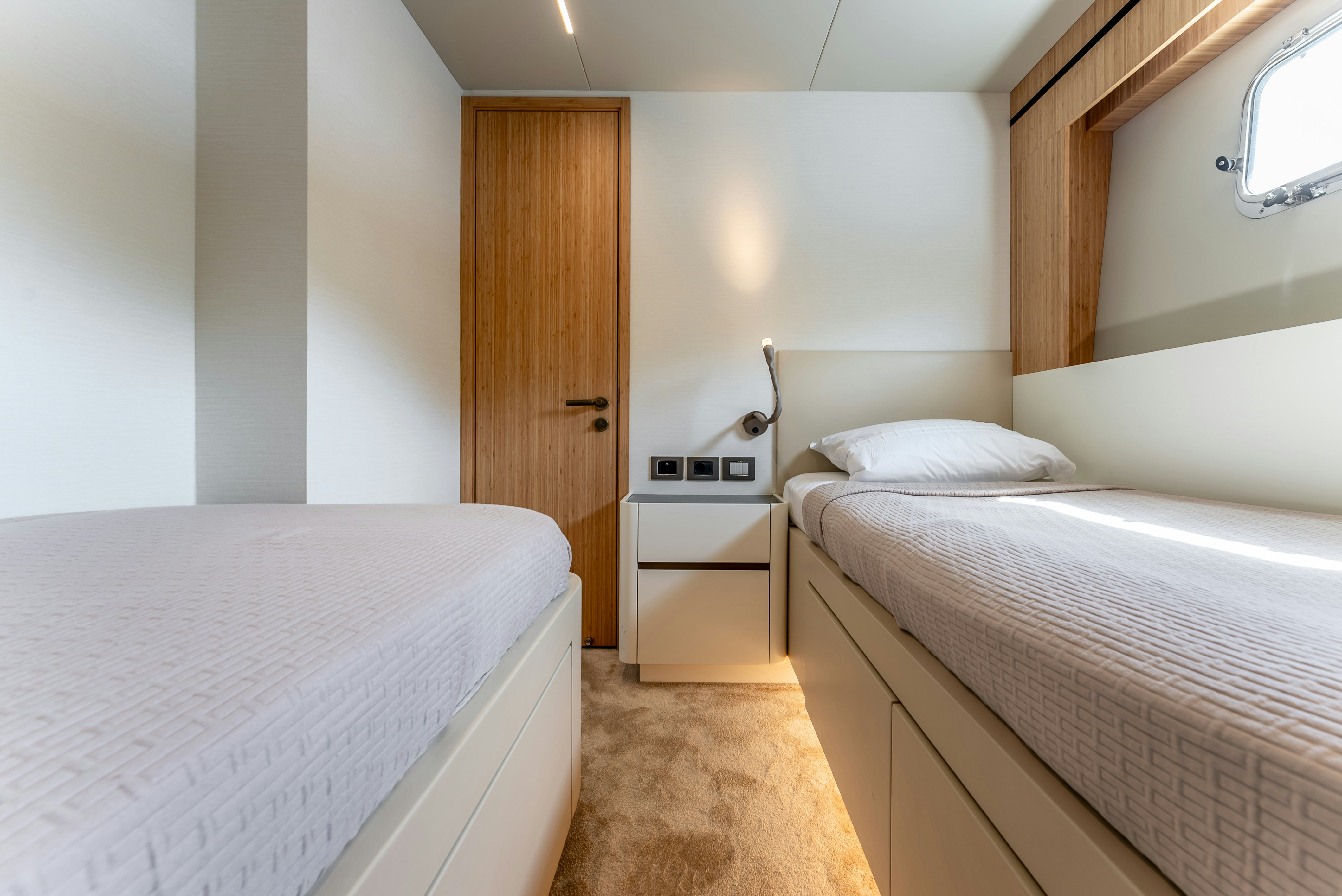 a couple of beds in a room aboard LITTLE MERMAID Yacht for Sale