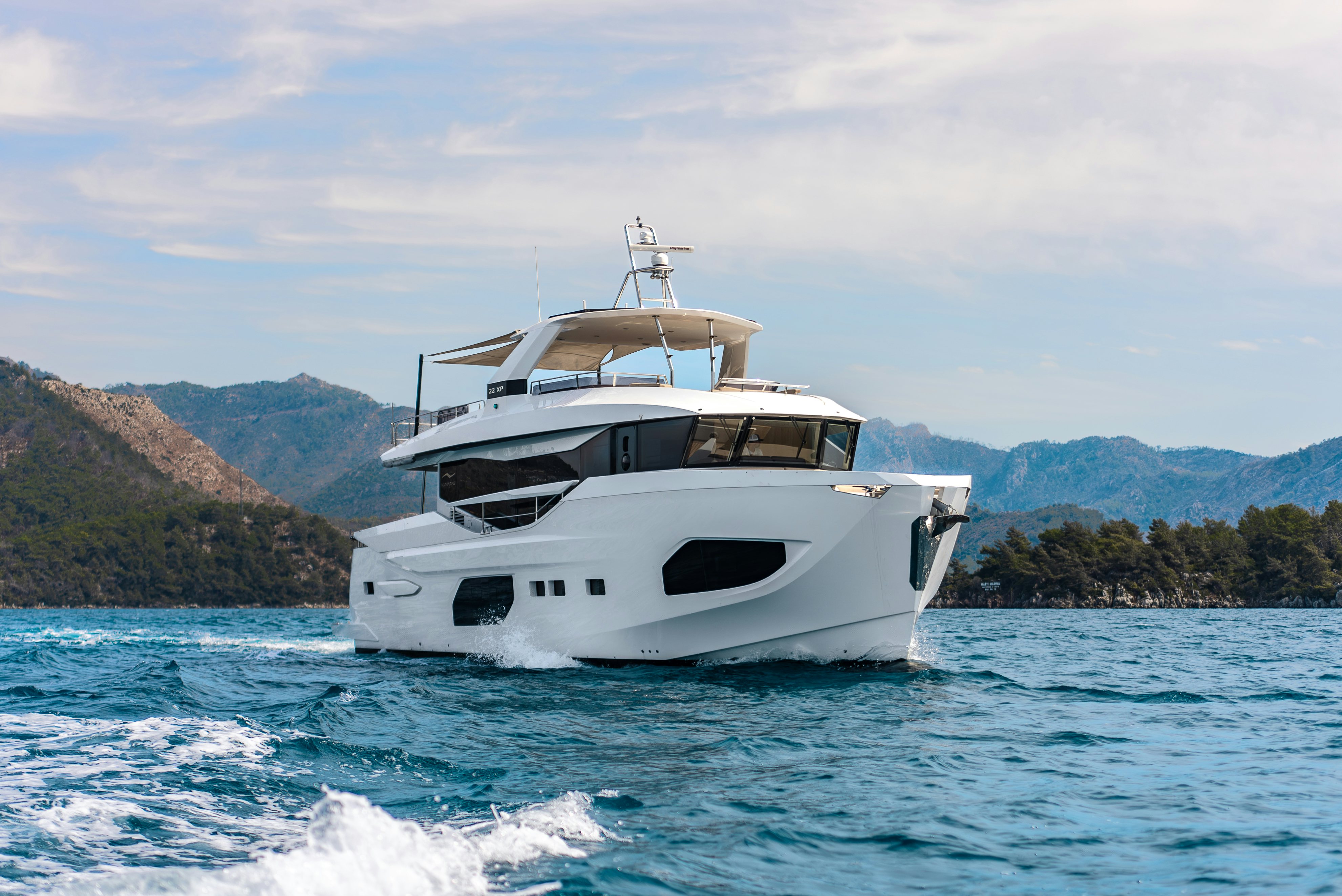 a white boat on the water aboard LITTLE MERMAID Yacht for Sale