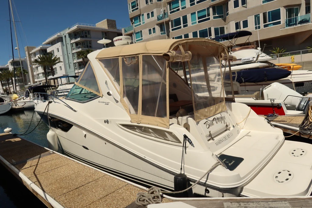 a boat parked on a dock aboard BON VOYAGE Yacht for Sale