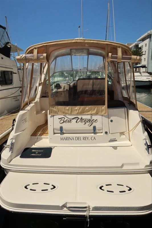 a white bus parked in a parking lot aboard BON VOYAGE Yacht for Sale