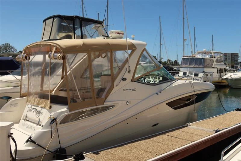 a boat docked at a pier aboard BON VOYAGE Yacht for Sale