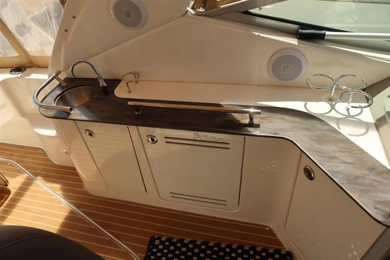 a silver stove with a metal pan on top aboard BON VOYAGE Yacht for Sale