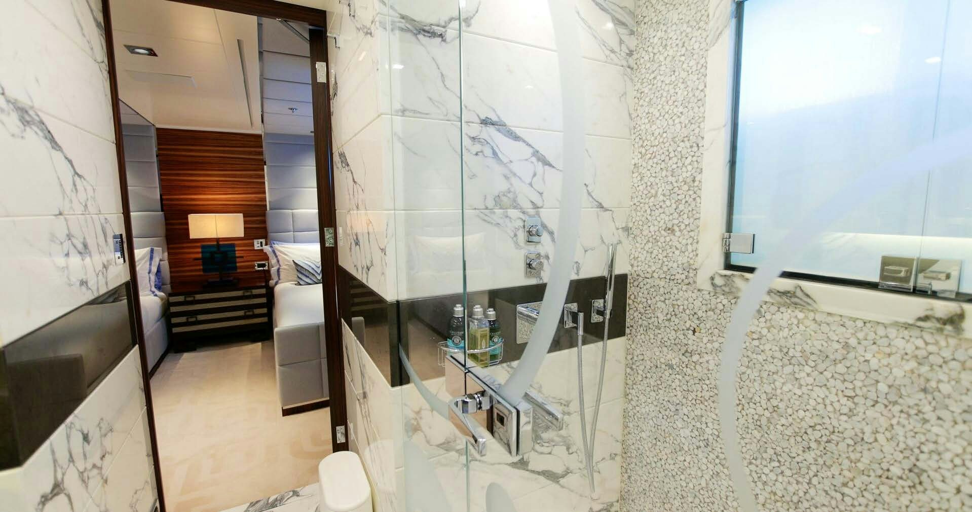 a room with a glass door aboard W Yacht for Charter