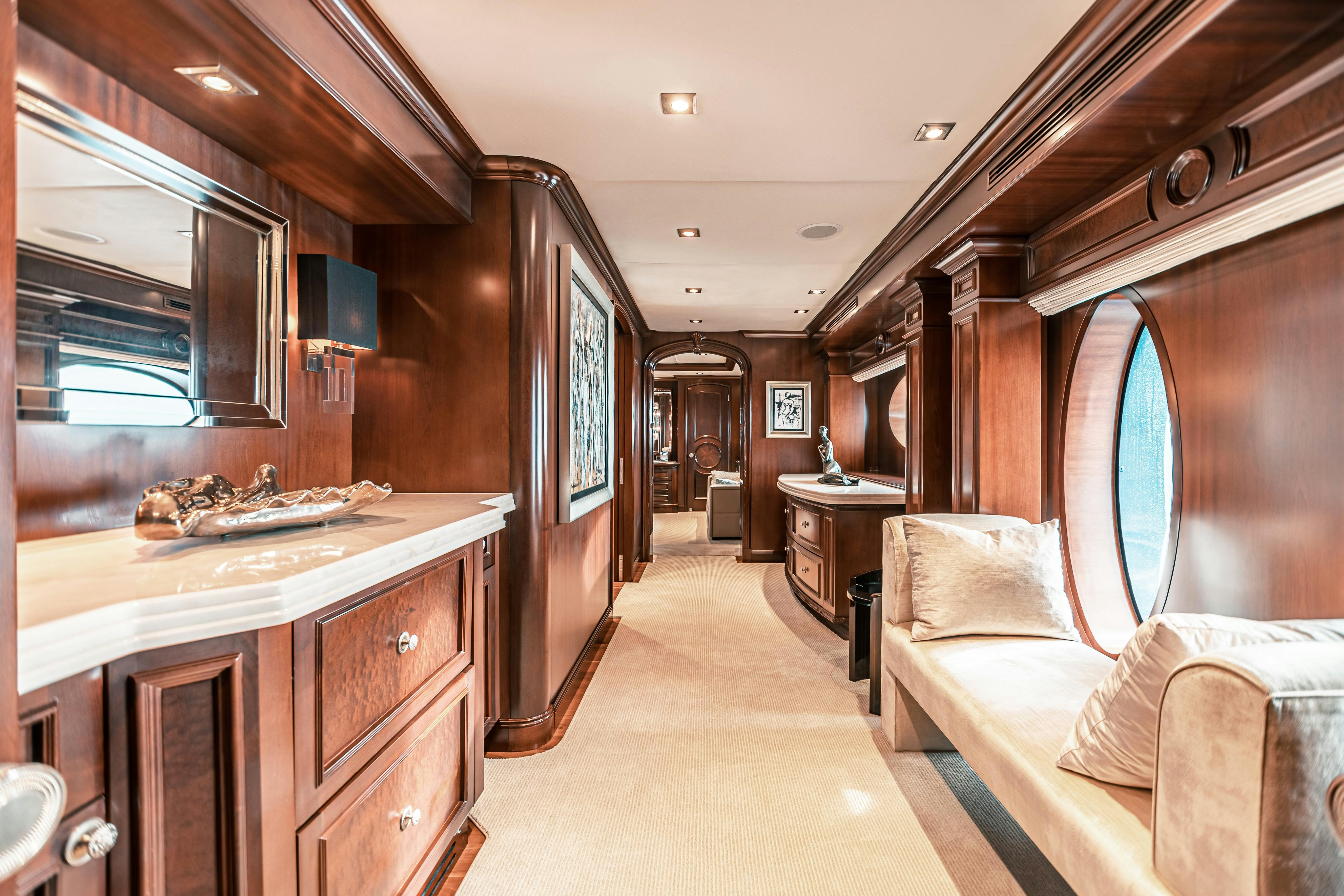 a room with a bed and a sink aboard MIRABELLA Yacht for Charter