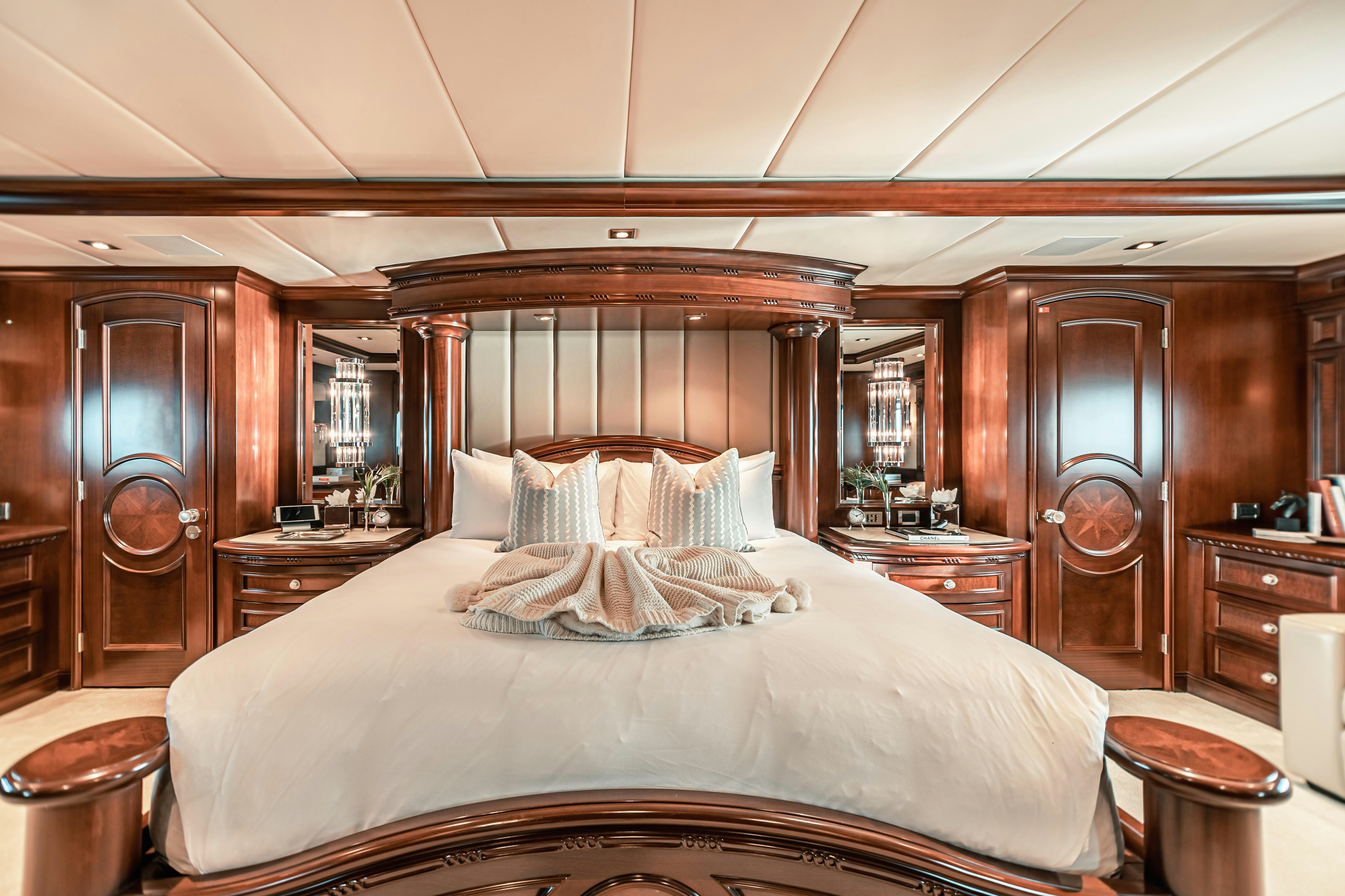 a large bedroom with a large bed aboard MIRABELLA Yacht for Charter