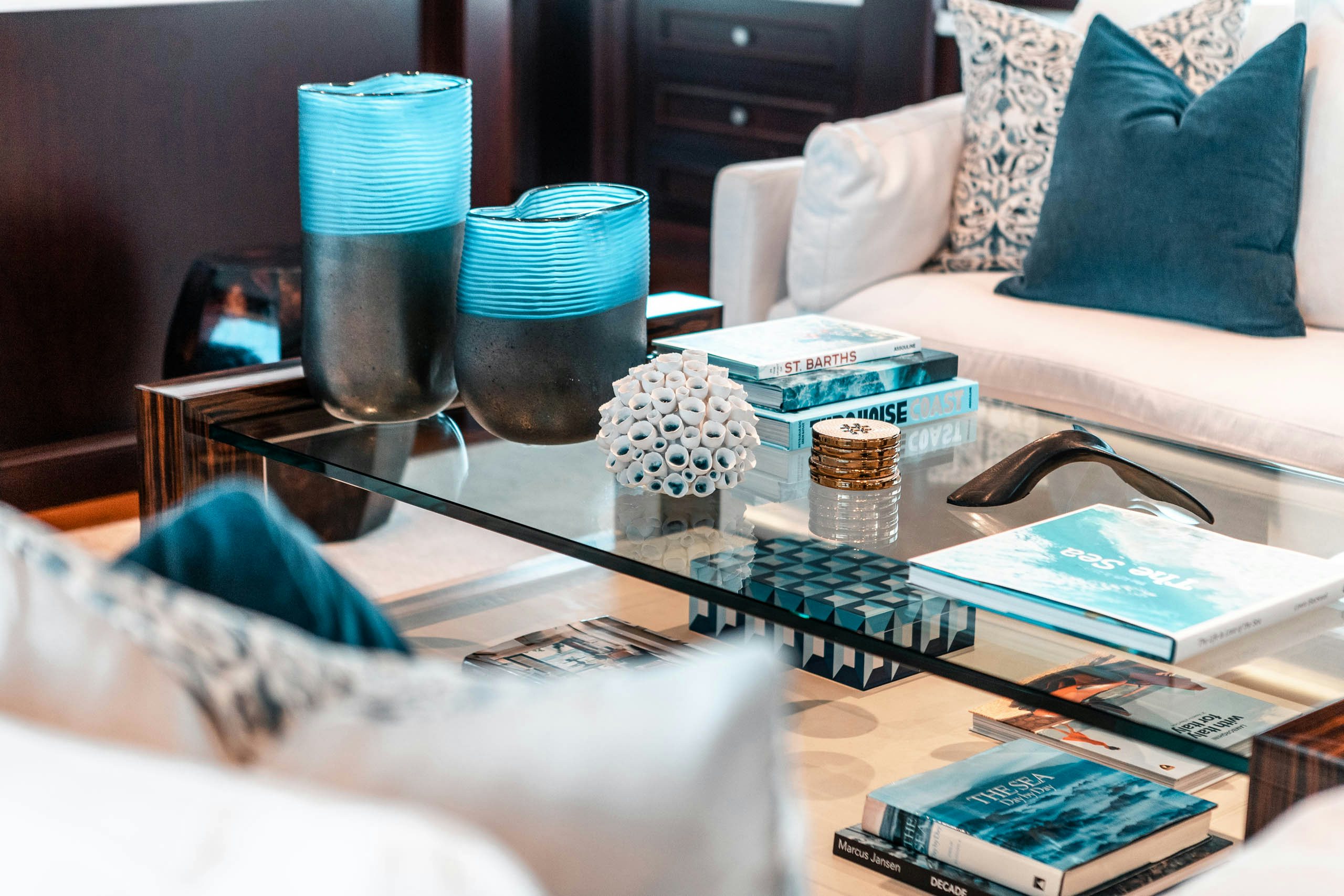 a table with a variety of objects on it aboard MIRABELLA Yacht for Charter