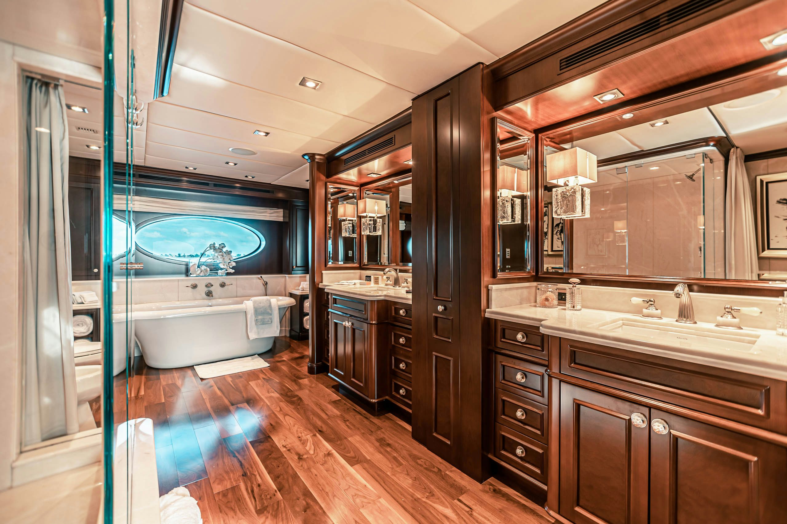 a bathroom with a large mirror aboard MIRABELLA Yacht for Charter