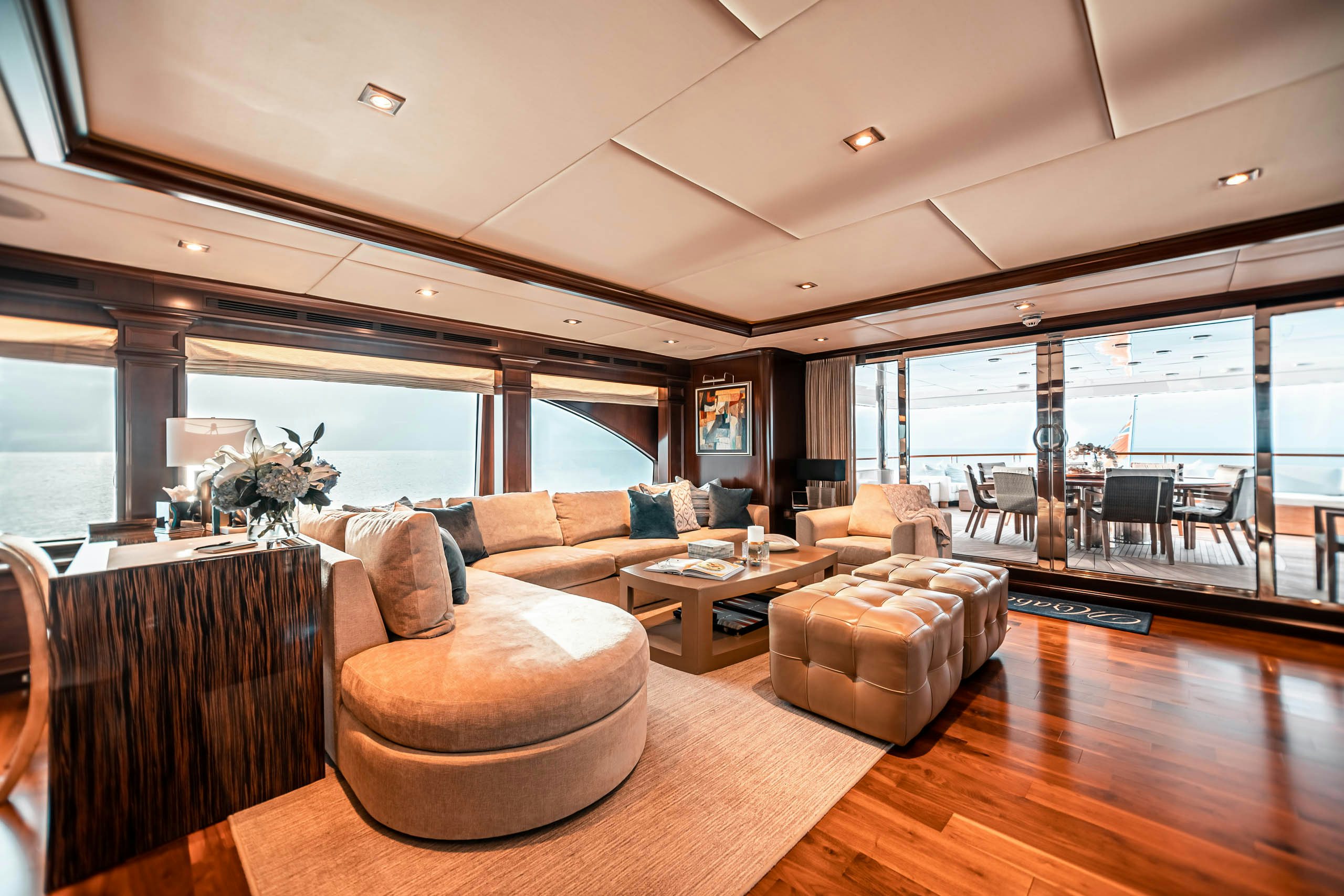 a living room with a large window aboard MIRABELLA Yacht for Charter