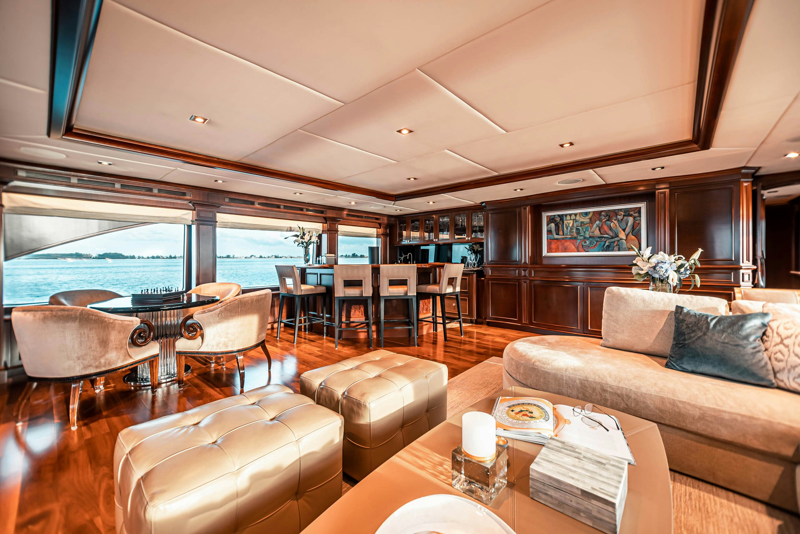 a living room with a large glass window aboard MIRABELLA Yacht for Charter