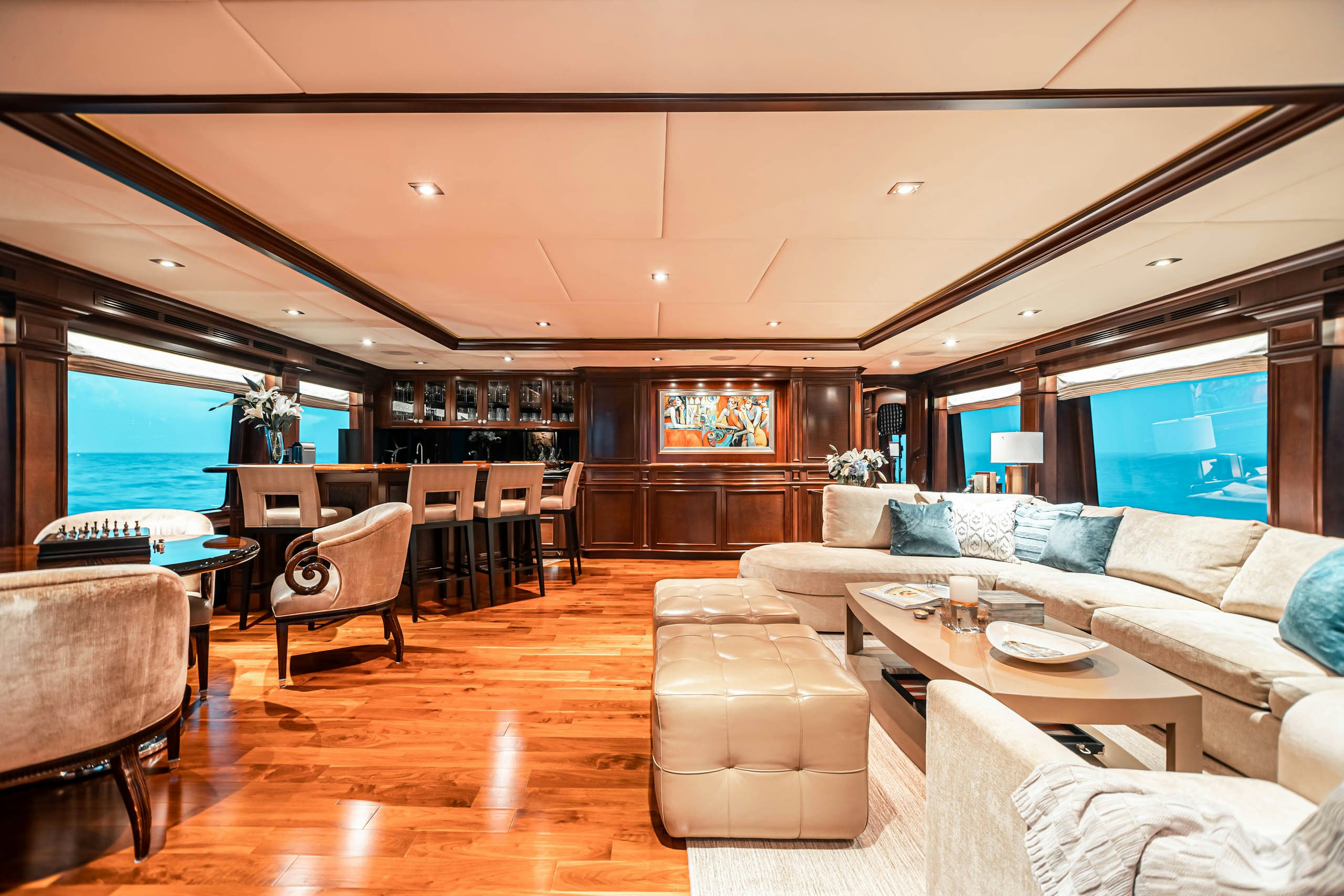 a living room with a large window aboard MIRABELLA Yacht for Charter