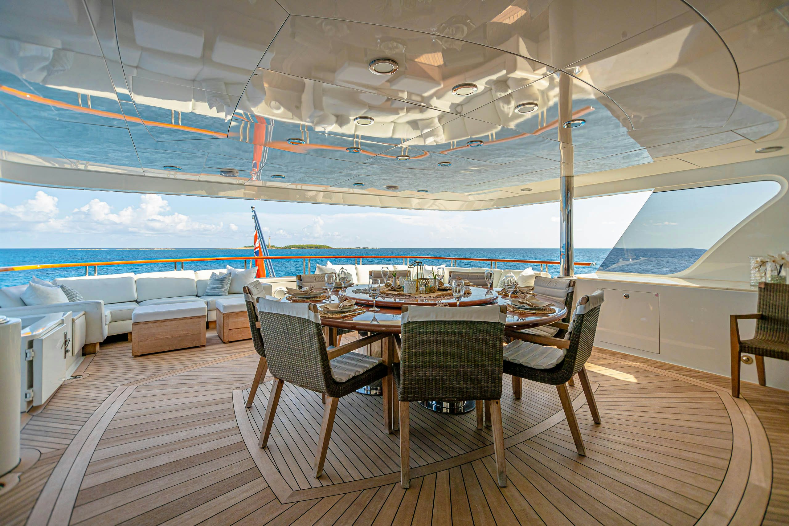 a table set for a meal on a cruise ship aboard MIRABELLA Yacht for Charter